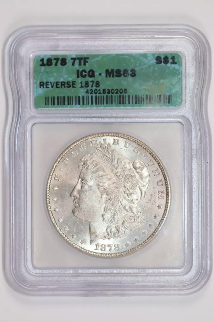 ICG MS63 Morgan Dollar 7TF 1878: ICG MS63 Morgan Dollar 7TF 1878 Experience the beauty of the 1878 Morgan Dollar, one of the most iconic coins in American history. This stunning ICG MS63 7TF specimen boasts exceptional silver content