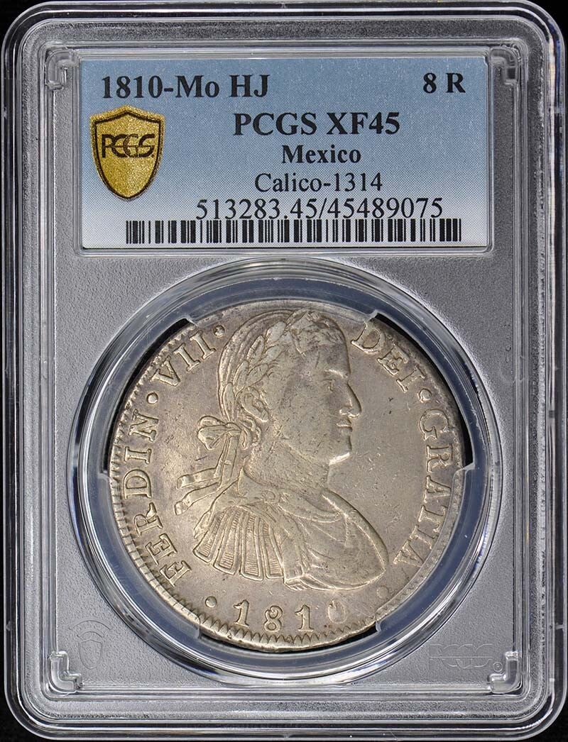 1810-Mo HJ Mexico Calico - 1314 8 Reales PCGS XF45: 1810-Mo HJ Mexico Calico - 1314 8 Reales PCGS XF45 Experience the vibrant colors and rich history of 1810s Mexico with this stunning circulated 8 Reales coin, certified by PCGS as an XF45. Struck in