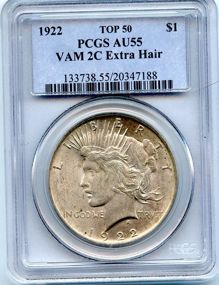 PCGS AU55 50 PEACE DOLLAR EXTRA HAIR TOP 1922 VAM-2C: PCGS AU55 50 PEACE DOLLAR EXTRA HAIR TOP 1922 VAM-2C Experience the rare charm of the 1922 Peace Dollar, one of the most iconic coins in American numismatics. This PCGS AU55 graded coin boasts an impr