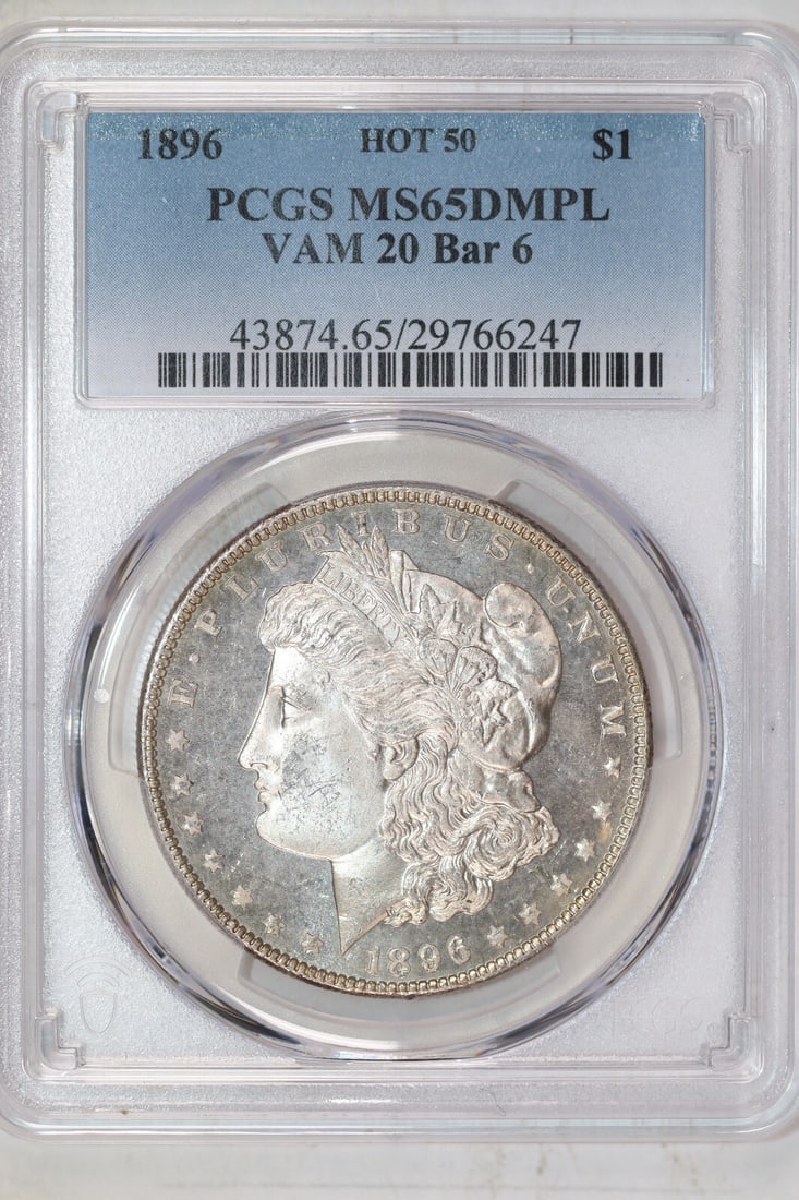 1896 VAM-20 "BAR 6" MORGAN DOLLAR PCGS MS65 DMPL - PCGS POP 1/ 0 - FINEST KNOWN: 1896 VAM-20 "BAR 6" MORGAN DOLLAR PCGS MS65 DMPL - PCGS POP 1/ 0 - FINEST KNOWN Experience the rarest of rarities with this 1896 VAM-20 "BAR 6" Morgan Dollar, graded MS65 by PCGS and boasting an incre