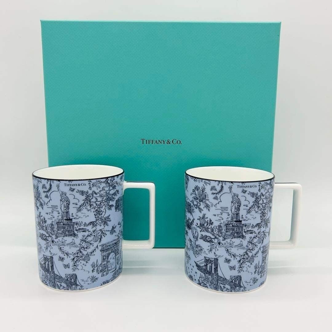 TIFFANY Mug Teal Blue Set Of 2 Bone China Collectible Drinkware With Box Manual: TIFFANY Mug Teal Blue Set Of 2 Bone China Collectible Drinkware With Box Manual Add a touch of elegance to your daily routine with these exquisite Tiffany bone china mugs, crafted from high-quality ma