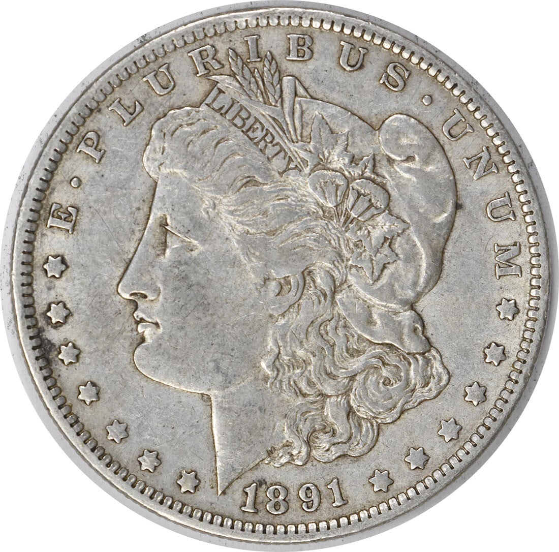 1891-O Morgan Silver Dollar EF Uncertified: 1891-O Morgan Silver Dollar EF Uncertified Experience the beauty of the 1891-O Morgan Silver Dollar, a highly sought-after coin from one of America's most iconic series. With its striking design and r