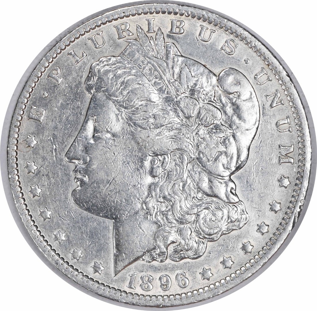 1896-O Morgan Silver Dollar EF Uncertified: 1896-O Morgan Silver Dollar EF Uncertified Experience the beauty of the 1896-O Morgan Silver Dollar, a highly sought-after coin from one of America's most iconic series. With its striking reeded edge