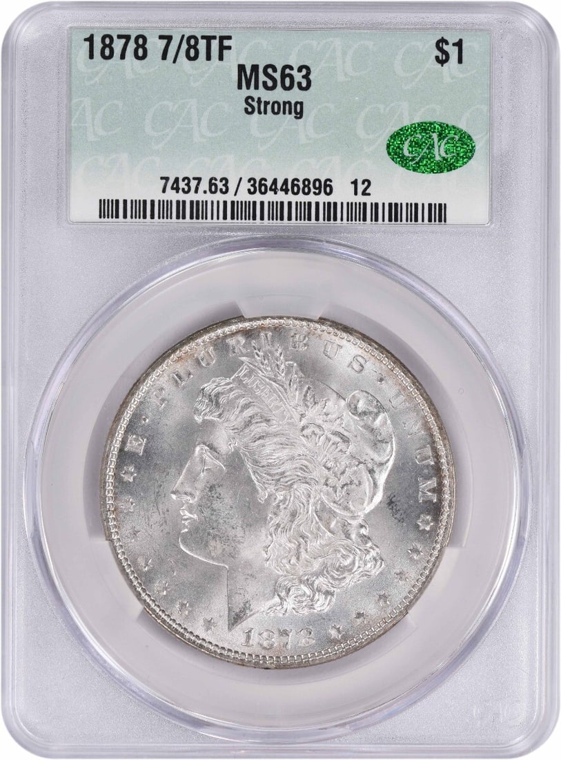 1878 Morgan Silver Dollar 7/ 8TF Strong MS63 CACG: 1878 Morgan Silver Dollar 7/ 8TF Strong MS63 CACG This stunning 1878 Morgan Silver Dollar is a true treasure for collectors, boasting an impressive MS63 grade and strong 7/8 TF (tarnish-free)
