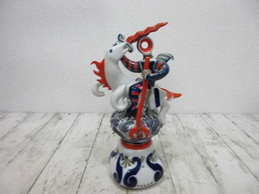 Porcelain figurine from hand-painted Sargadelos Santiago Matarratas Galicia Spain.: Porcelain figurine from hand-painted Sargadelos Santiago Matarratas Galicia Spain. Experience the vibrant culture of Spain with this stunning, hand-painted porcelain figurine from Sargadelos, a renown