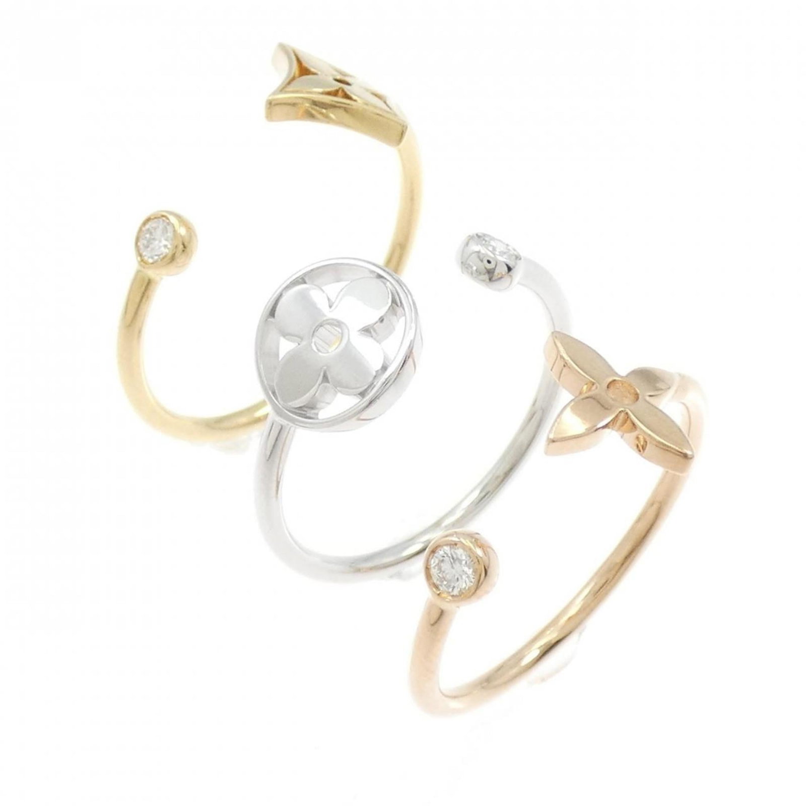 Pink Gold Louis Vuitton Band Ring 18K: Pink Gold Louis Vuitton Band Ring 18K This 18K pink gold band ring from Louis Vuitton boasts a sleek design with a diamond stone, adding a touch of luxury to any outfit. With its classic style and dur