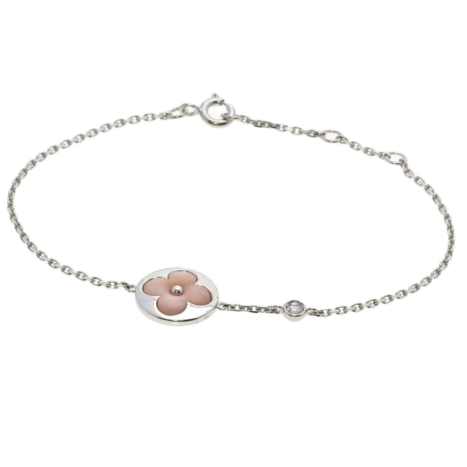Louis Vuitton bracelet: Louis Vuitton bracelet A 17cm white gold Louis Vuitton charm bracelet featuring a diamond and opal stone, crafted with 18K metal. This pre-owned piece showcases some minor signs of wear, including scr