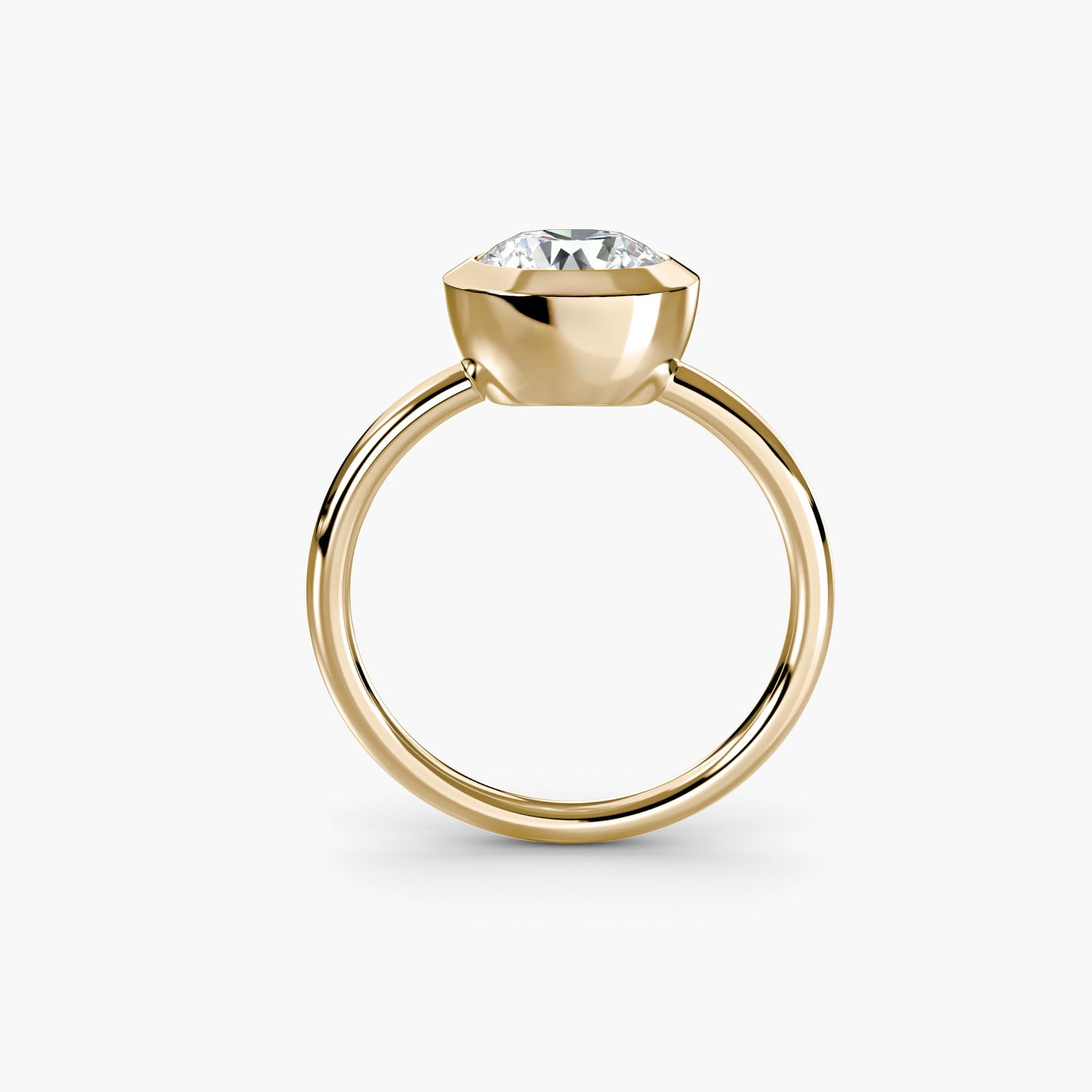 Solitaire Round 18Kt Yellow Gold Ring Setting: Solitaire Round 18Kt Yellow Gold Ring Setting Elegant simplicity is at its finest with this 18Kt yellow gold ring setting, featuring a round solitaire design that exudes understated sophistication.