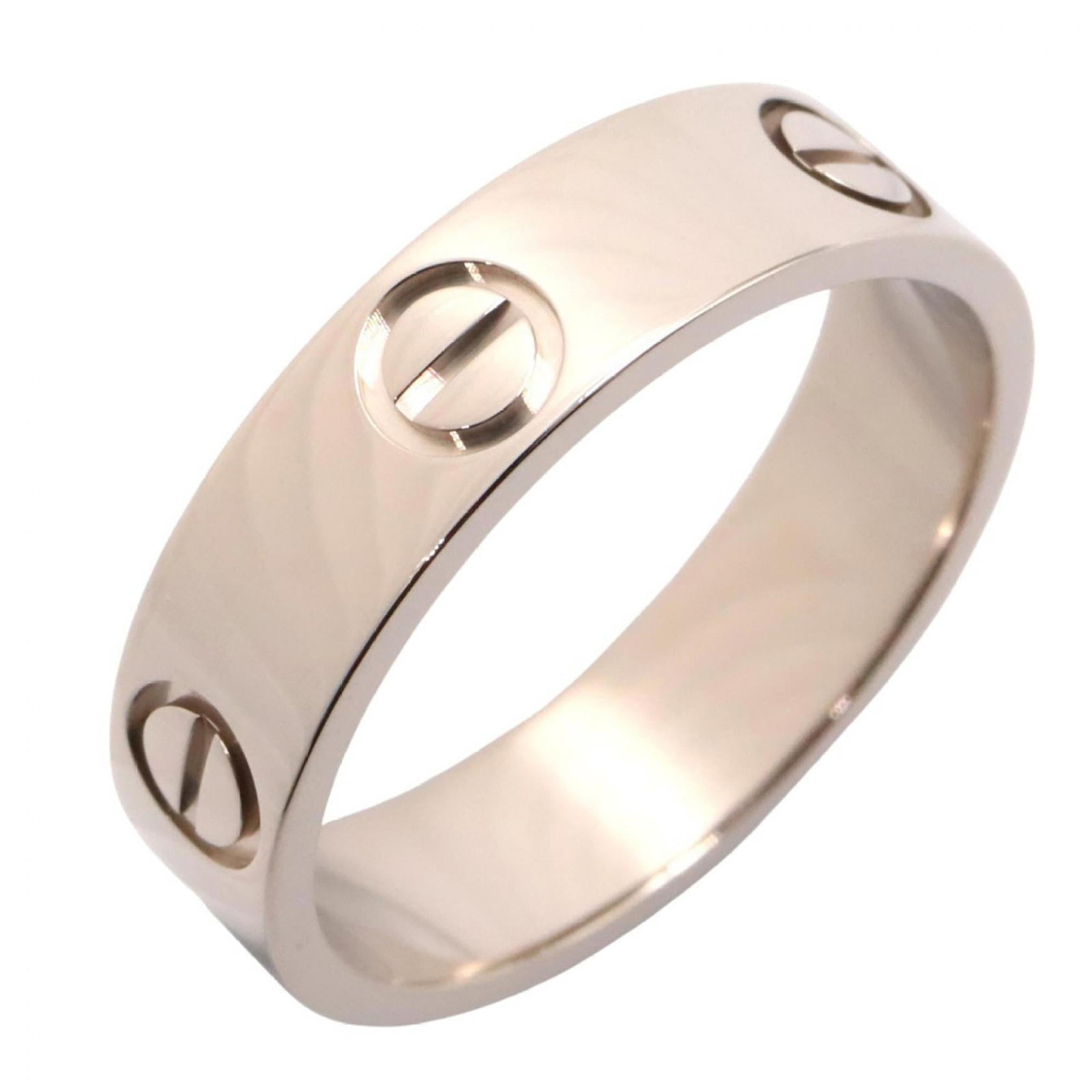 Cartier white gold ring band: Cartier white gold ring band A sleek and sophisticated 18K white gold ring band from Cartier, crafted with high-quality materials for a timeless look. This used (like new) piece boasts hardly any