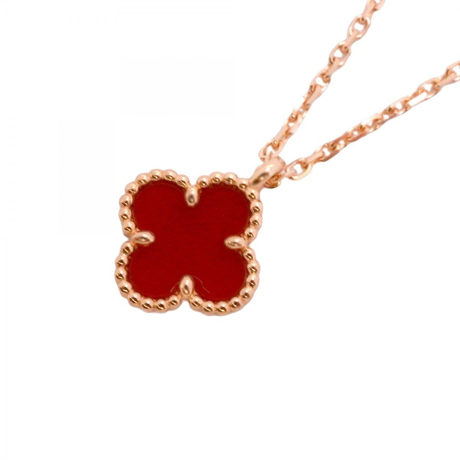 Van Cleef & Arpels Sweet Alhambra Necklace in 18K Pink Gold and Carnelian Red: Van Cleef & Arpels Sweet Alhambra Necklace in 18K Pink Gold and Carnelian Red Discover the timeless elegance of Van Cleef & Arpels' Sweet Alhambra Necklace, crafted in 18K pink gold and adorned with v