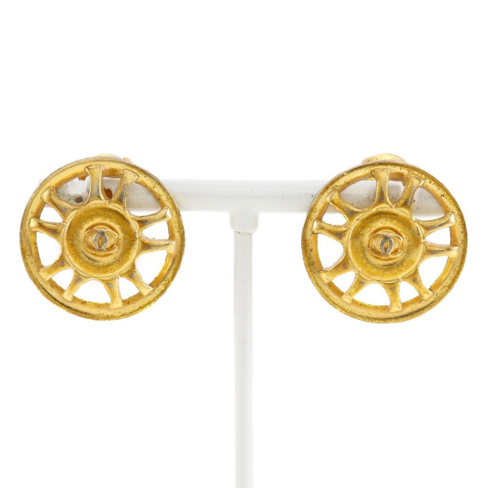 Earrings by Chanel: Earrings by Chanel Elegant clip earrings from iconic French fashion house Chanel, featuring a timeless design that adds sophistication to any outfit. With their classic style and durable
