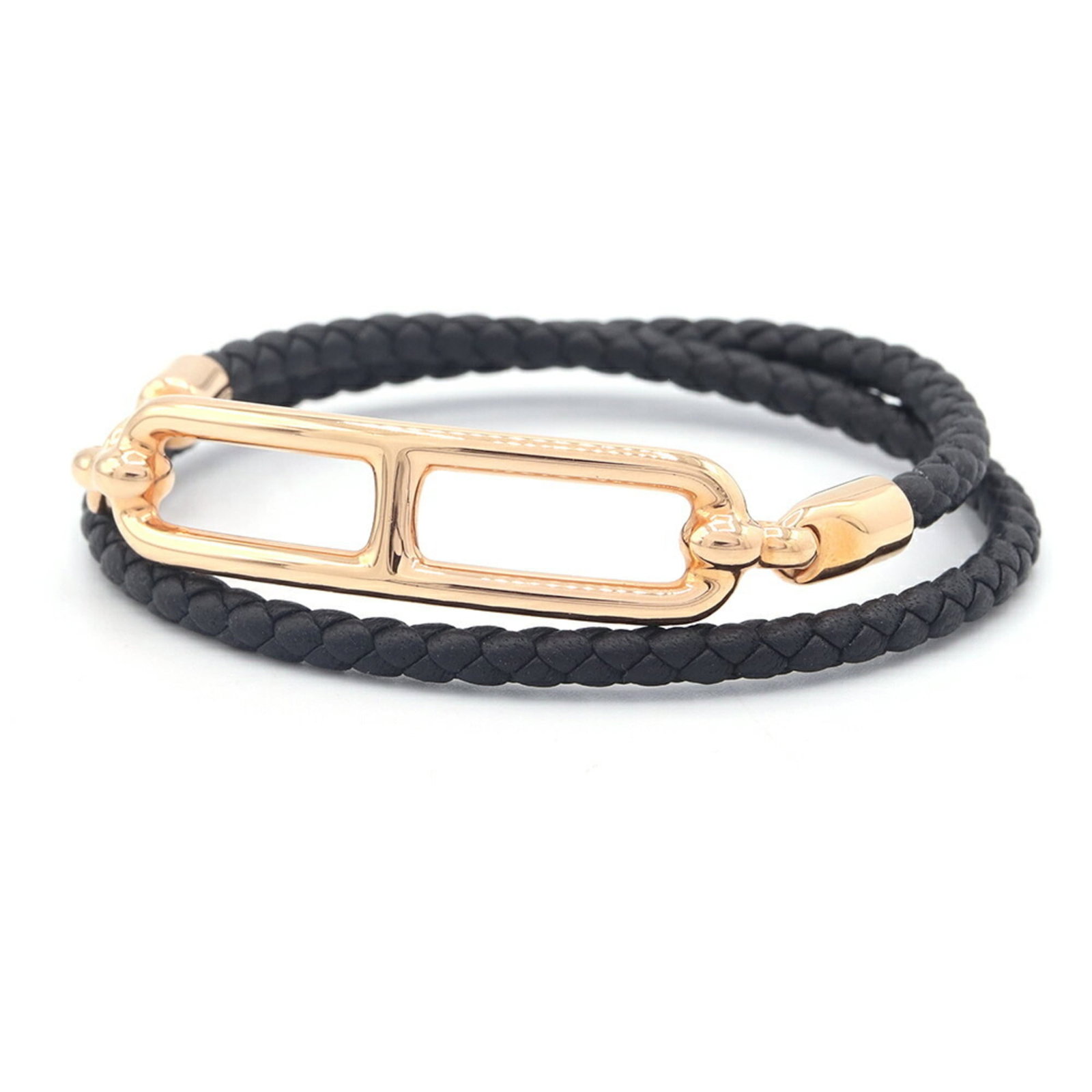 Hermes leather charm bracelet: Hermes leather charm bracelet A sleek and sophisticated black leather charm bracelet from Hermes, featuring a 15cm length with a slim 3.5mm width. Made from swift leather in pink gold, this delicate a