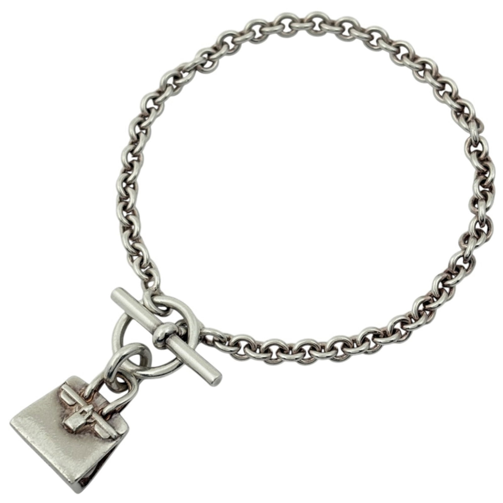 Hermes Charm Bracelet Silver 925: Hermes Charm Bracelet Silver 925 A delicate and timeless piece, this Hermes Charm Bracelet is crafted from sterling silver 925. With its classic design and elegant length of 17cm, it adds a touch of s