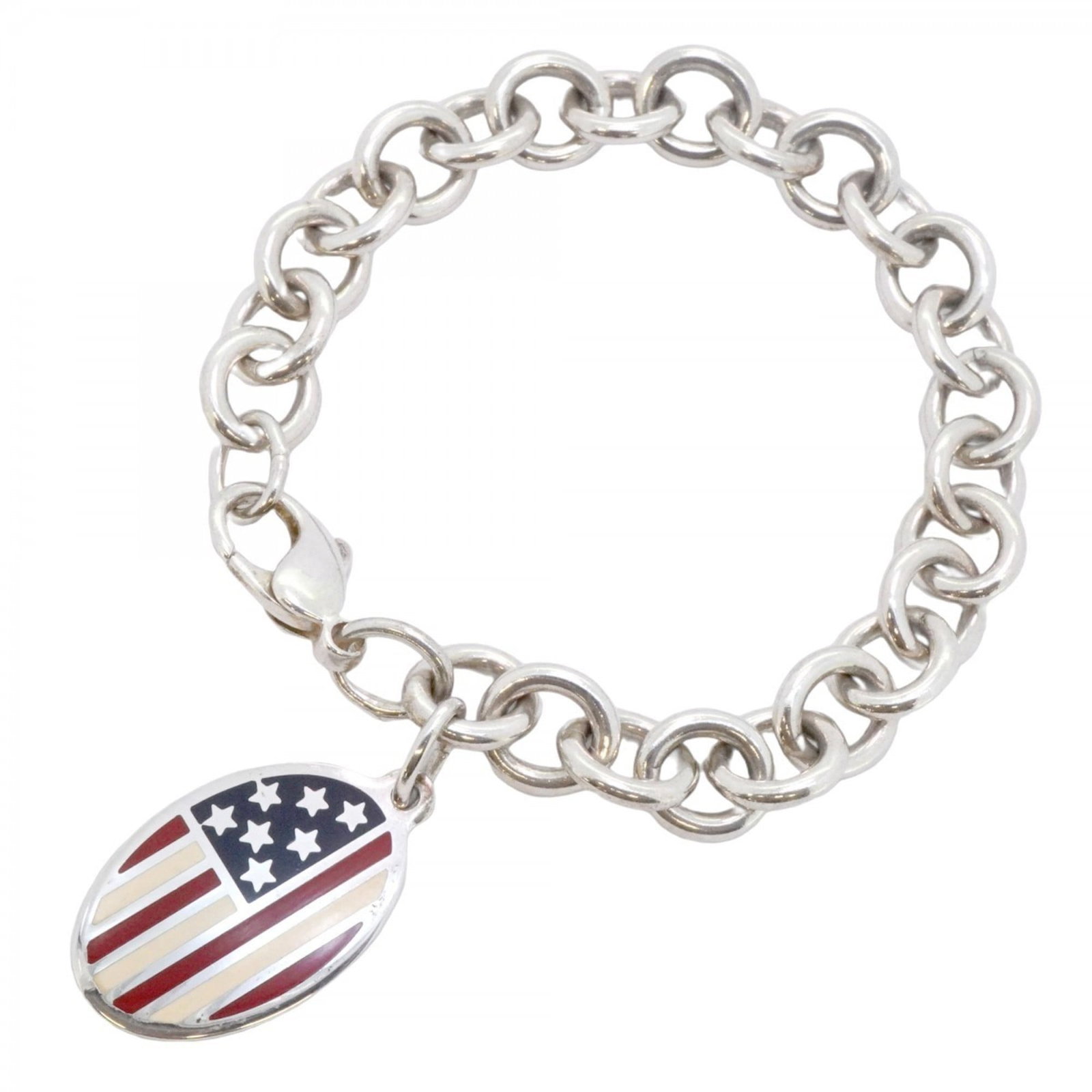 Tiffany Charm Bracelet Silver 925: Tiffany Charm Bracelet Silver 925 A delicate Tiffany charm bracelet made from sterling silver 925, this 17cm long piece showcases subtle signs of wear and gentle patina, adding to its understated