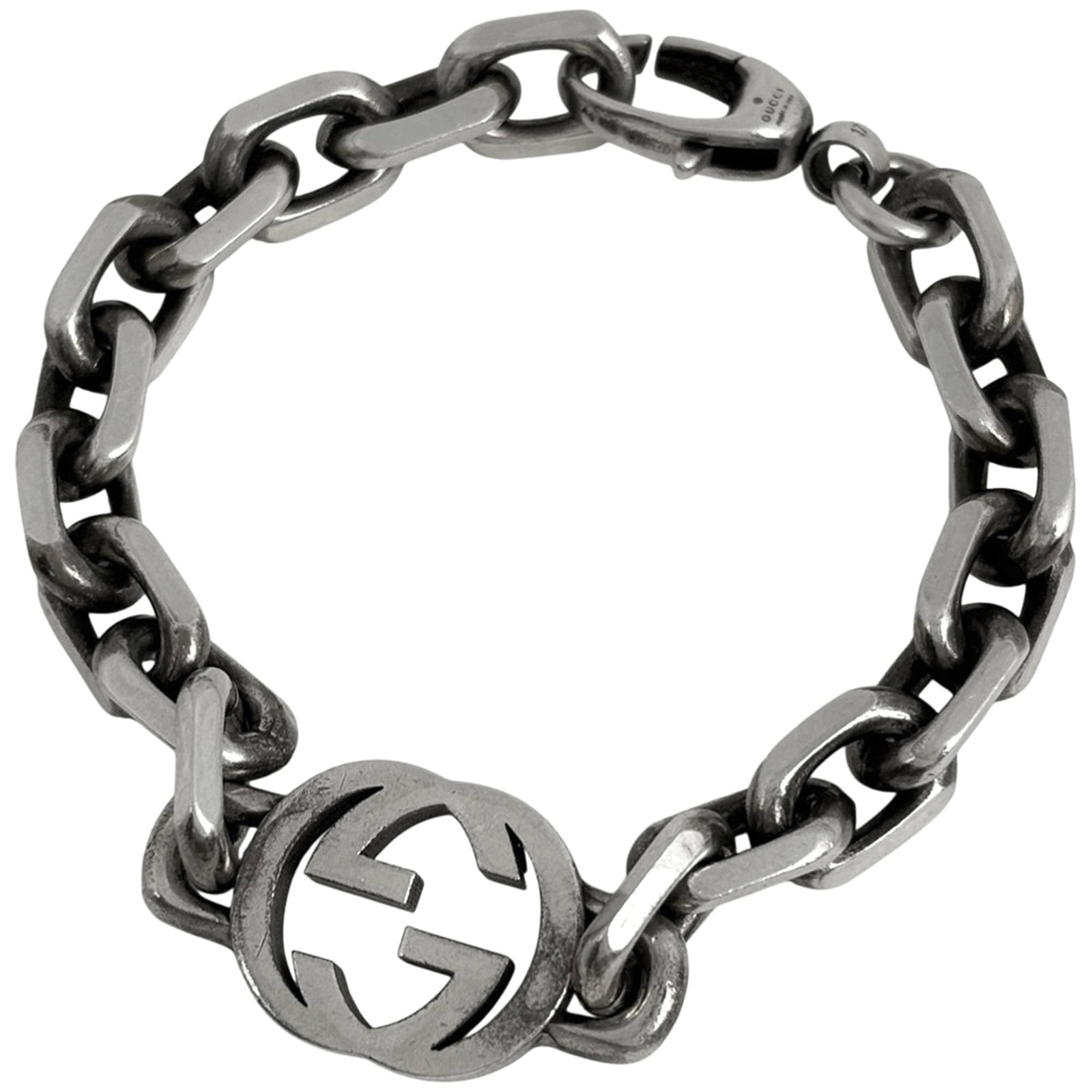 Gucci is a silver charm bracelet (1 of 5)