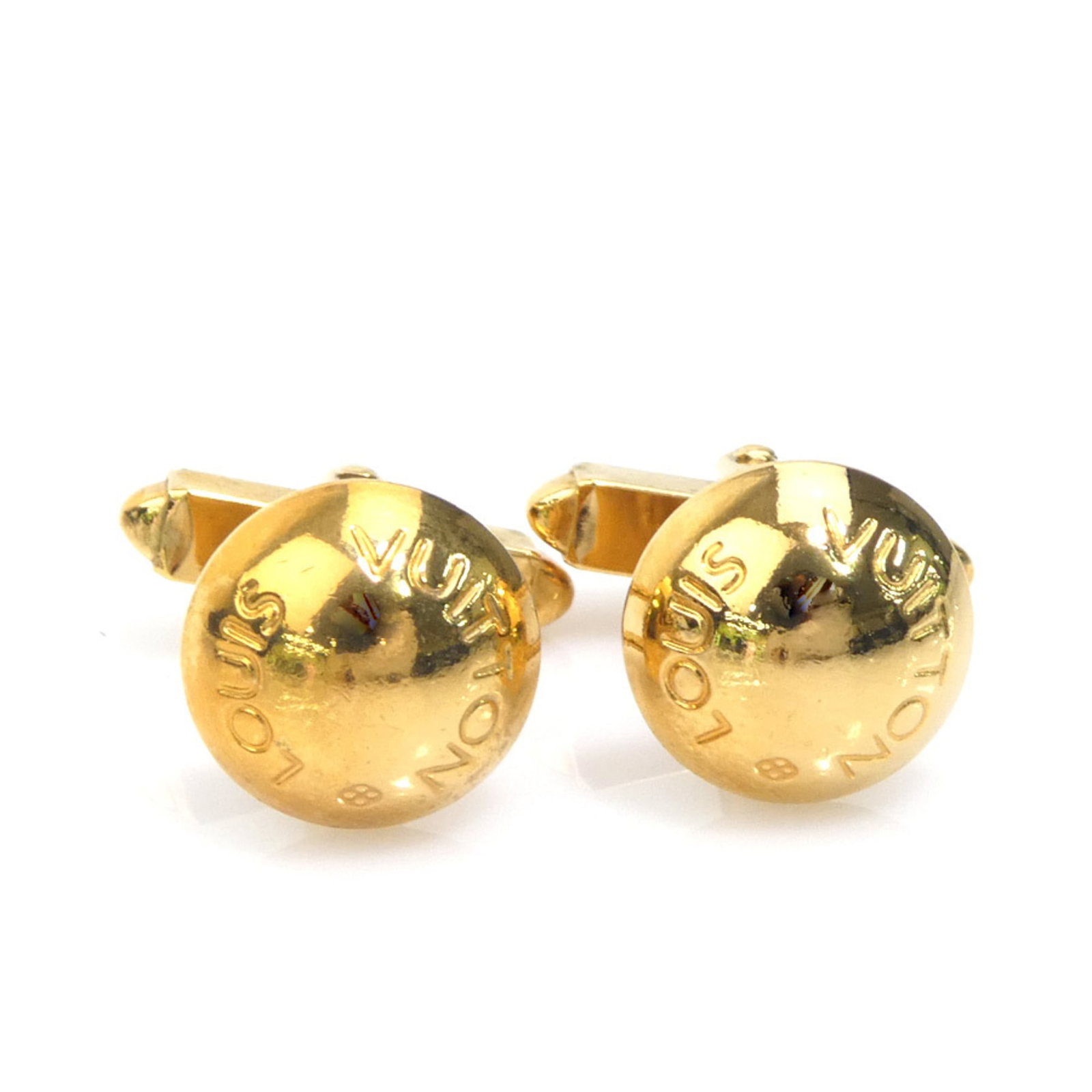 Metal Louis Vuitton cufflinks: Metal Louis Vuitton cufflinks Authentic Louis Vuitton metal cufflinks in dark green and gold, featuring a classic design with subtle wear from previous use. The cufflinks have a rectangular shape