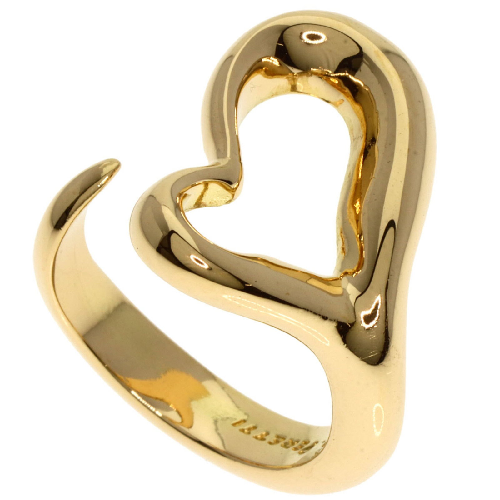 Tiffany 18k yellow gold band ring: Tiffany 18k yellow gold band ring A beautiful 18k yellow gold band ring from Tiffany, crafted with attention to detail and timeless elegance. This used ring boasts a rich, sunny hue and a slender