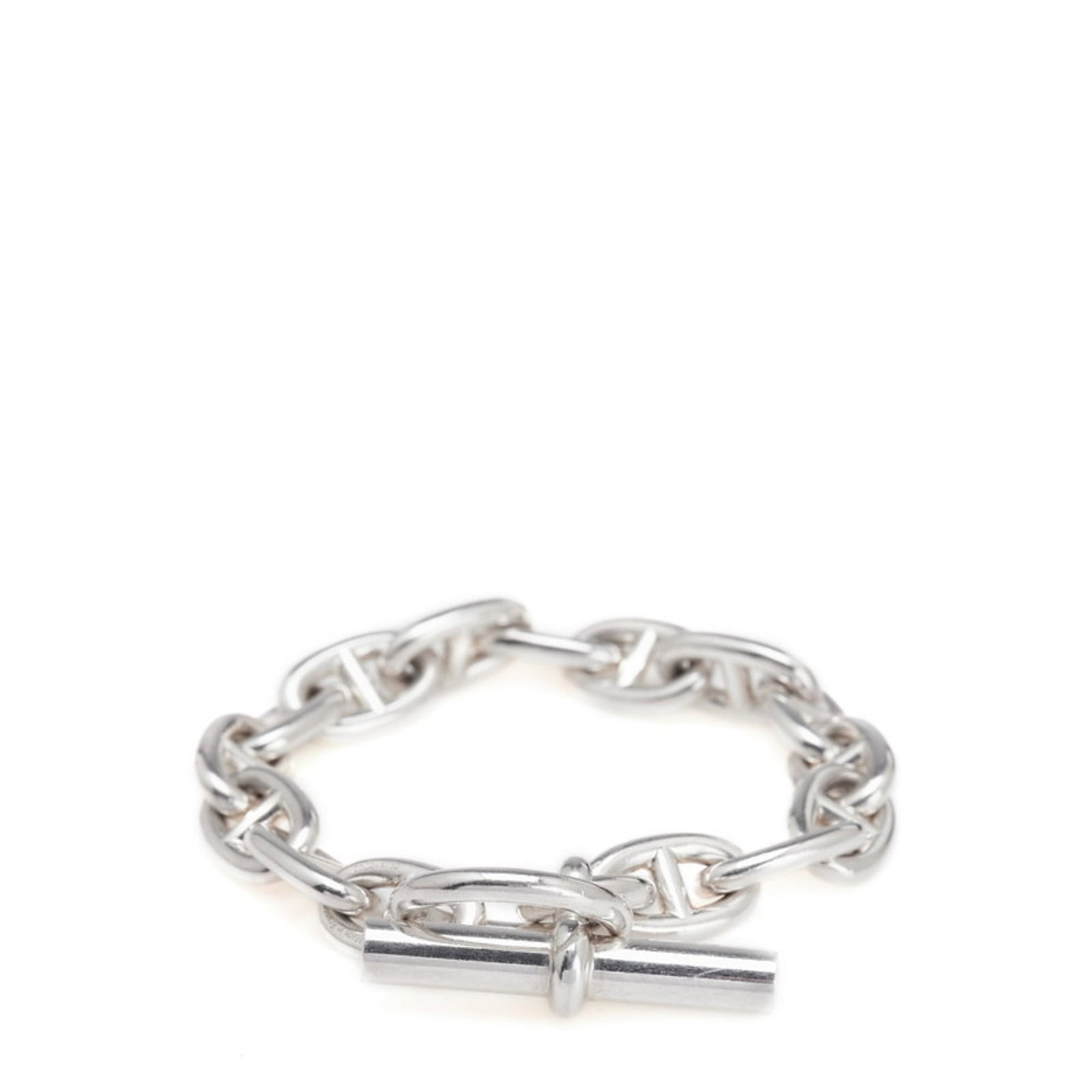 Hermes Charm Bracelet Silver 925: Hermes Charm Bracelet Silver 925 A pre-owned Hermes charm bracelet made from sterling silver (925), this 16.5cm long piece boasts a classic design that adds a touch of elegance to any outfit, with sub