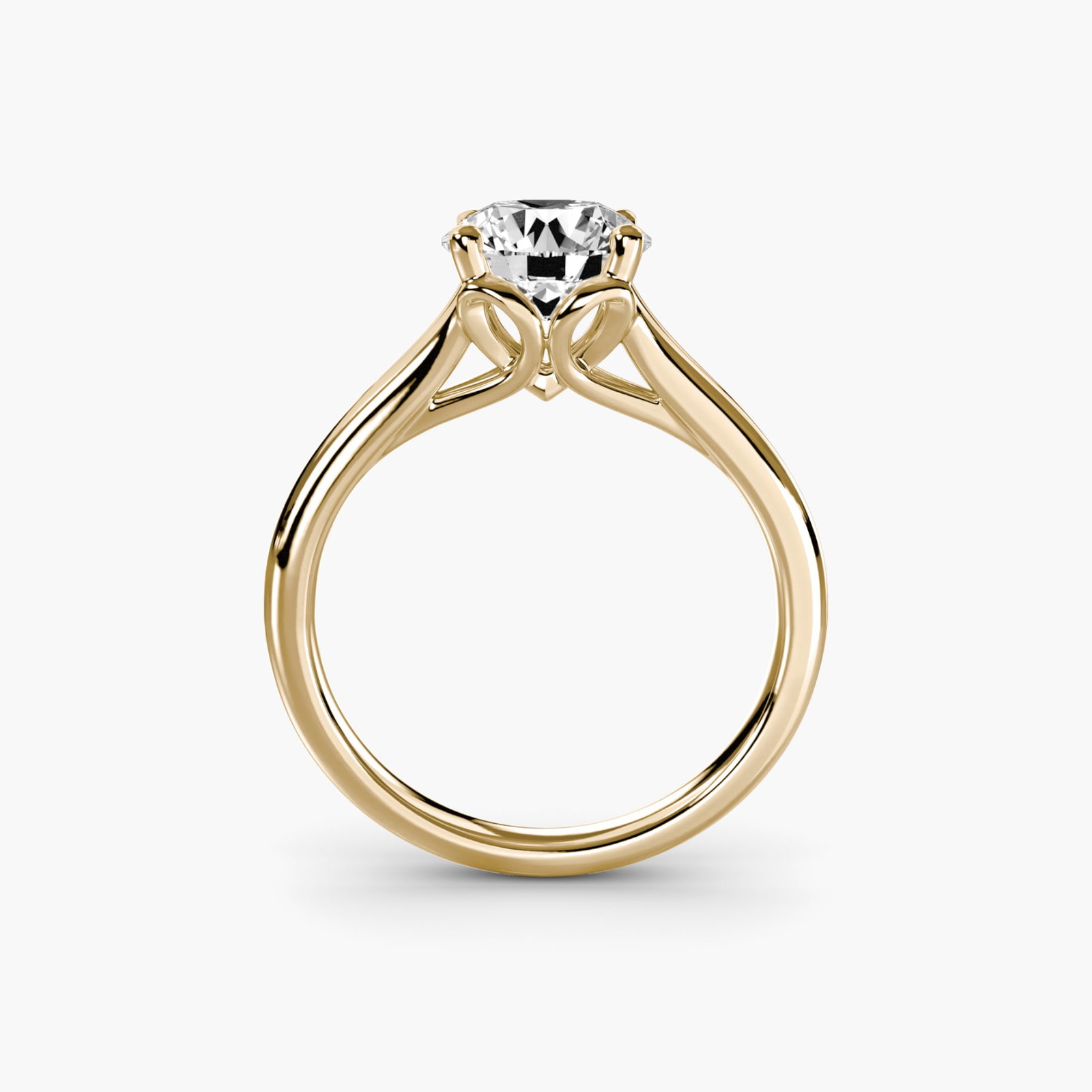 Solitaire Round 18Kt Yellow Gold Ring Setting: Solitaire Round 18Kt Yellow Gold Ring Setting Elevate your style with this stunning 18Kt yellow gold ring setting, perfect for showcasing a single elegant diamond. The round shape and slender band mak