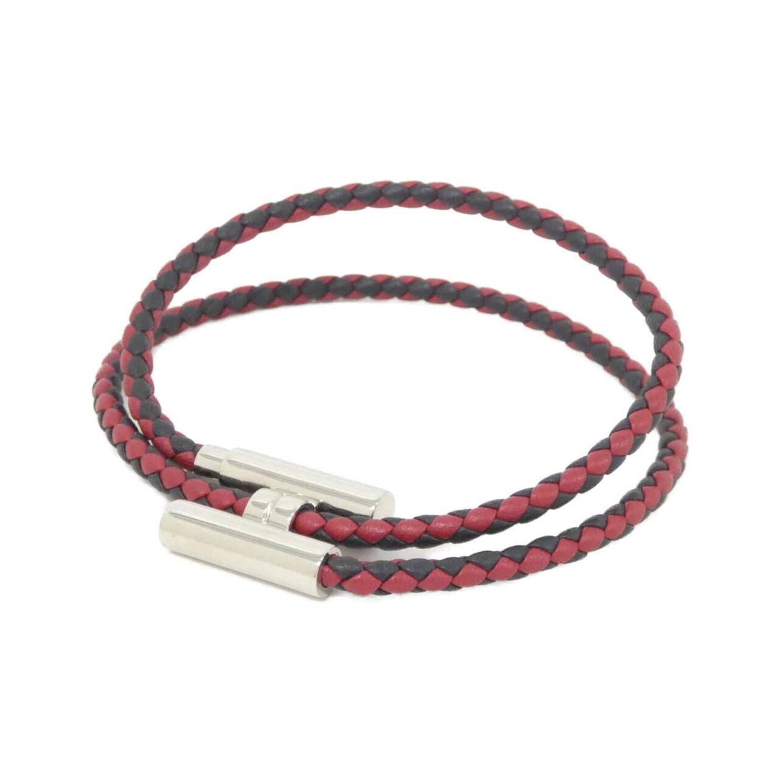 Hermes leather charm bracelet: Hermes leather charm bracelet A beautiful Hermes leather charm bracelet in rich blue indigo and red hues, adorned with silver accents, adds a touch of elegance to any outfit. Measuring 18cm in length,
