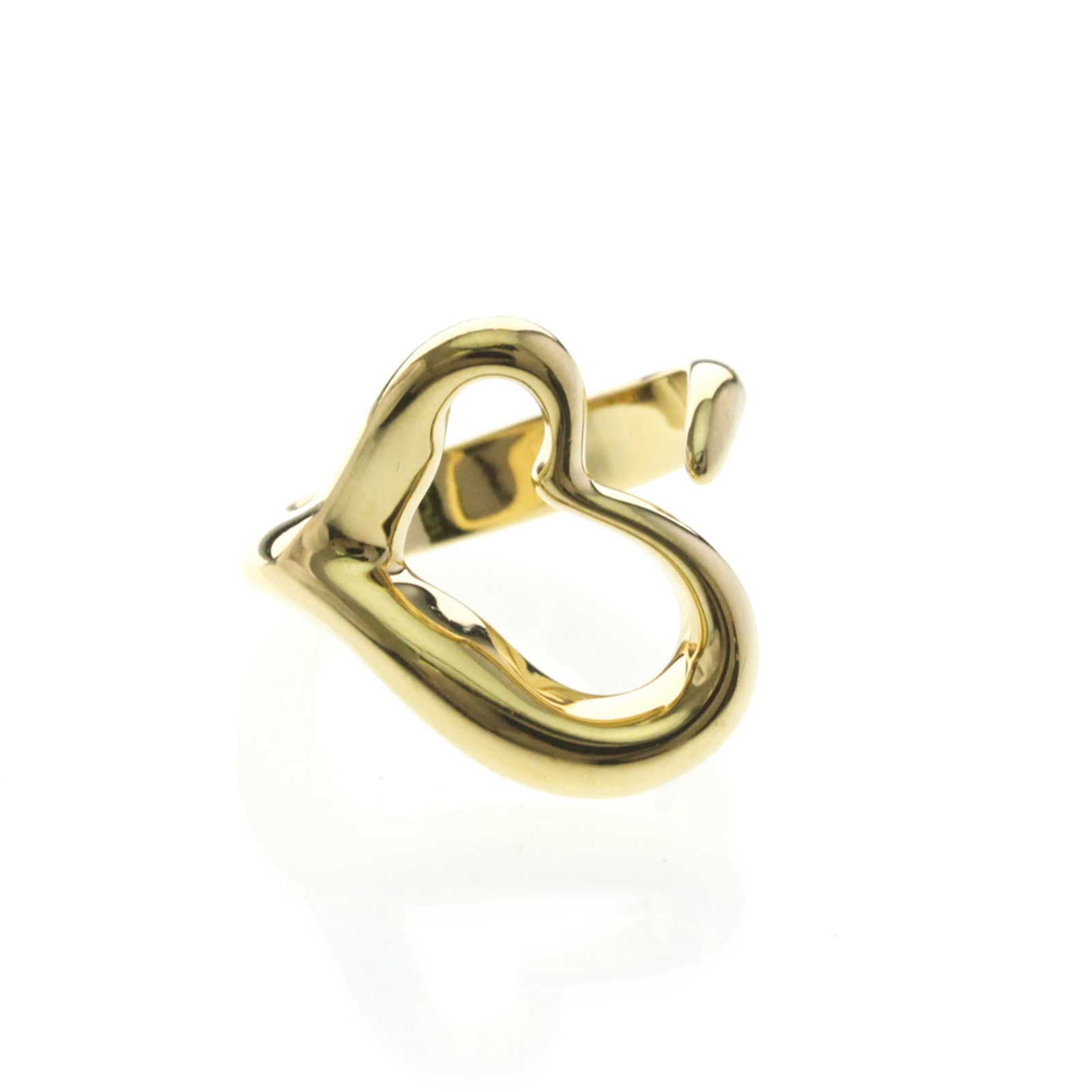 Tiffany 18k yellow gold band ring: Tiffany 18k yellow gold band ring A delicate 18k yellow gold band ring adds a touch of elegance to any outfit. Made from high-quality yellow gold, this slender ring boasts a classic design with a