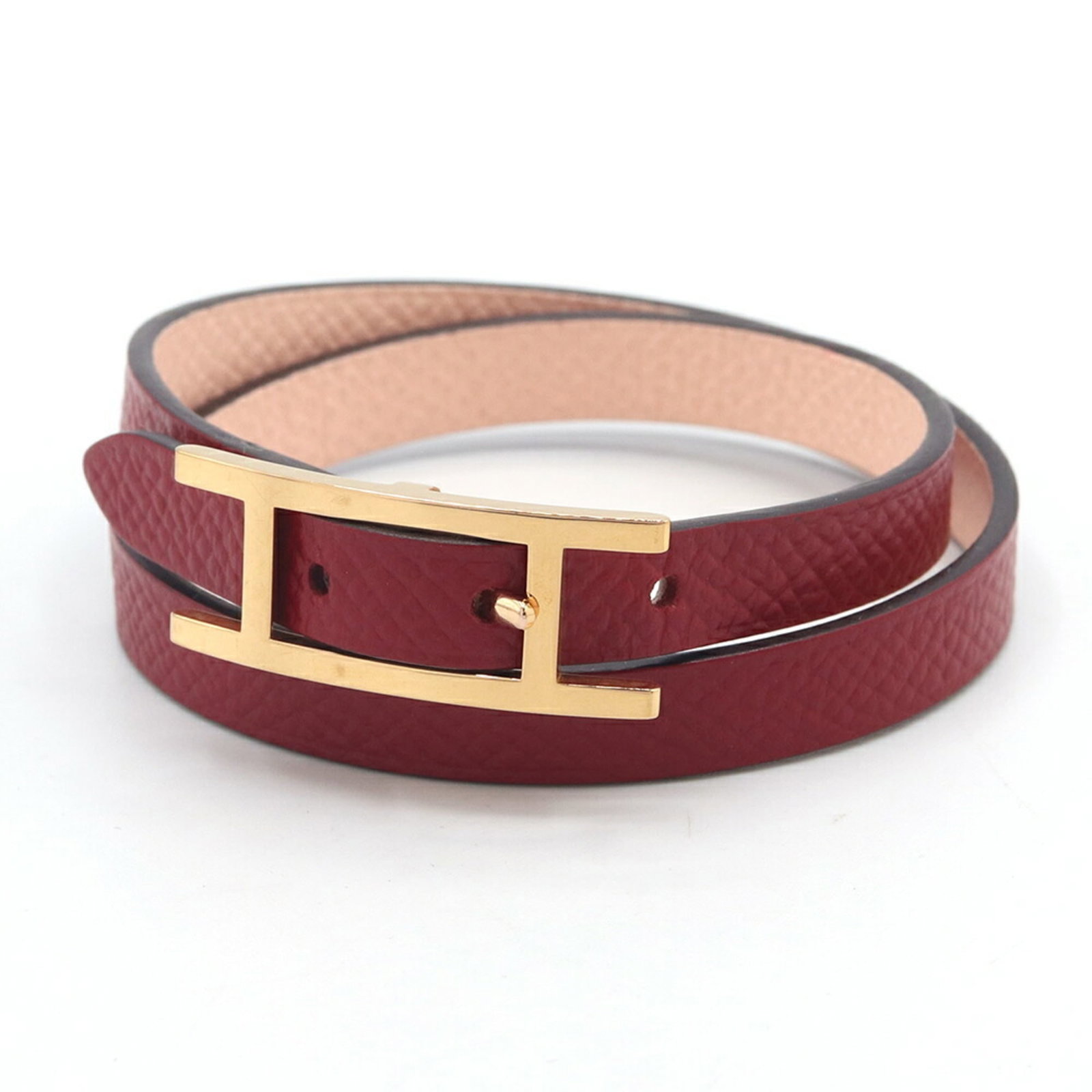 Hermes Charm Epsom Leather Bracelet: Hermes Charm Epsom Leather Bracelet Elevate your style with this Herm?s Epsom Leather Charm Bracelet in Rose Eglantine and Rouge Grenat hues. Made from high-quality Epsom leather, this classic charm