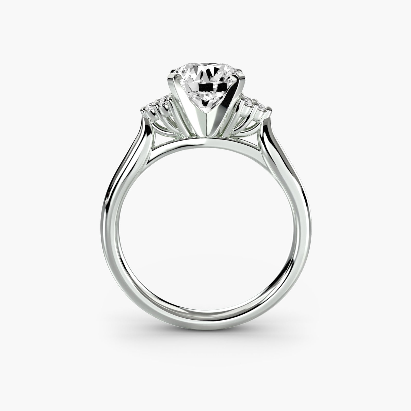 Solitaire Round 18Kt White Gold Ring Setting: Solitaire Round 18Kt White Gold Ring Setting Elegant simplicity is at the heart of this 18Kt White Gold Solitaire Ring Setting, featuring a round ring shape with a slender band width of 2.5mm. The set