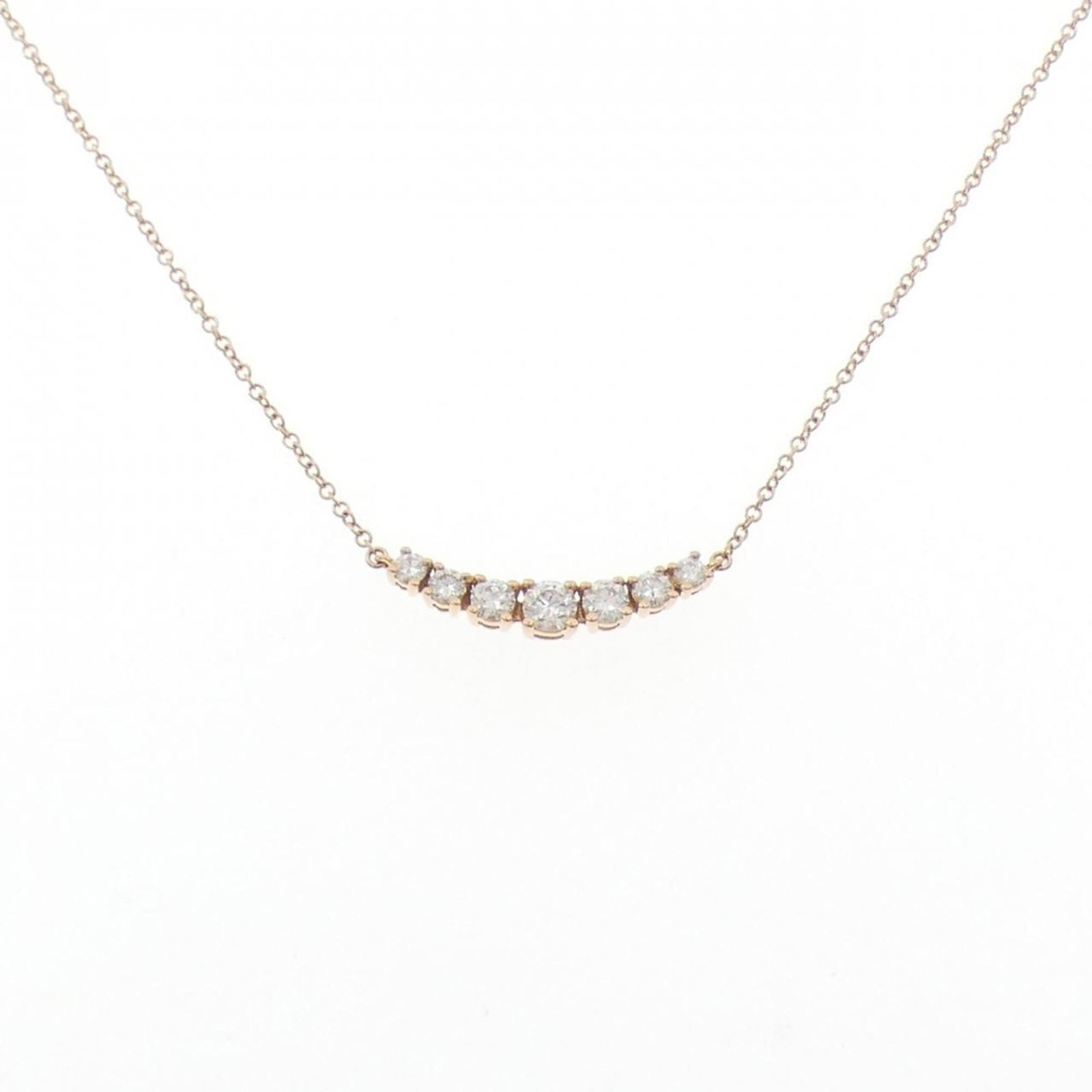 West East Tiffany Necklace: West East Tiffany Necklace A stunning 18K pink gold Tiffany necklace showcases a beautiful diamond pendant, crafted with attention to detail and timeless elegance. The necklace boasts a classic design