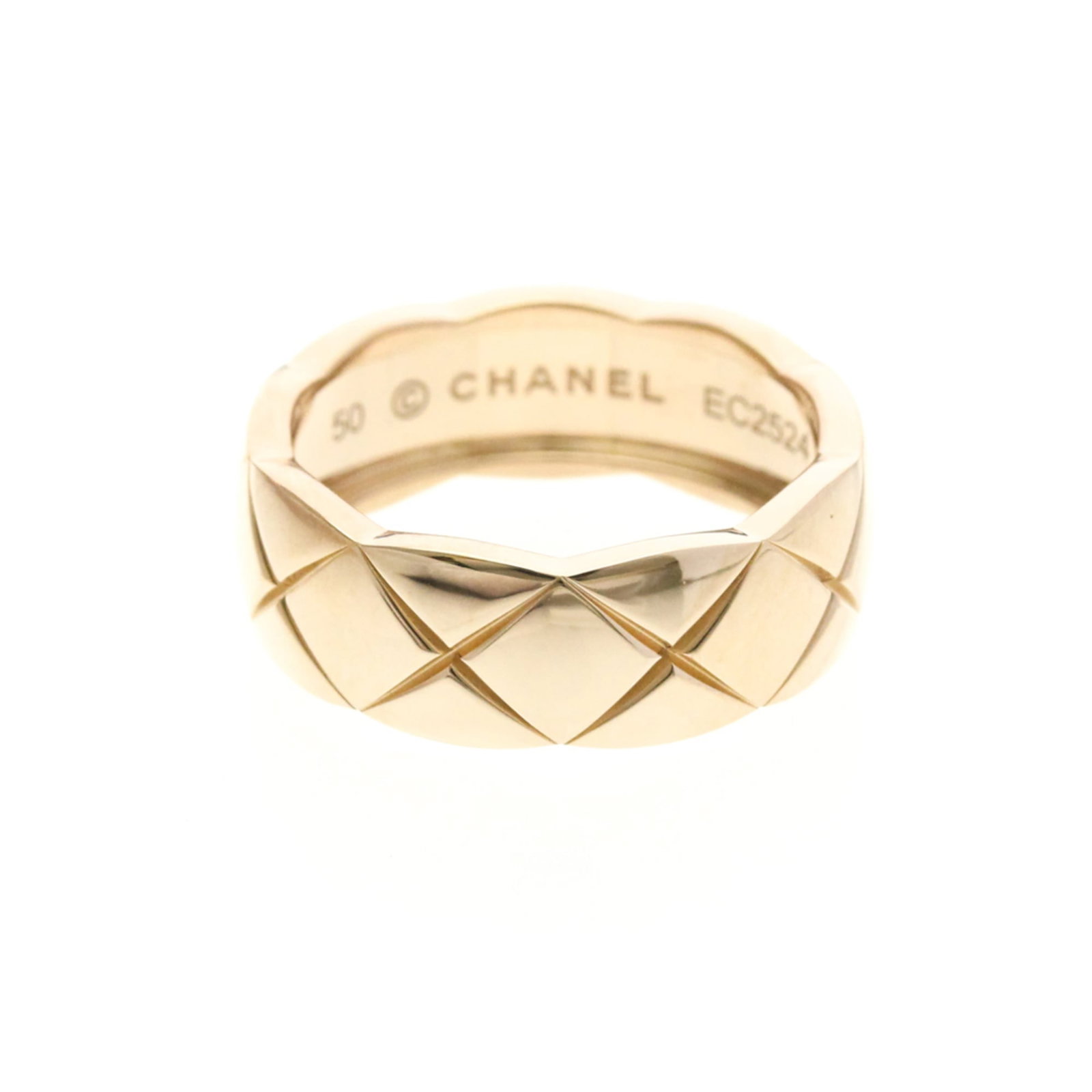 Pink Gold Chanel Band Ring (18K): Pink Gold Chanel Band Ring (18K) A delicate 18K pink gold band ring from Chanel adds a touch of elegance to any outfit. With its slender width and subtle pink hue, this ring is perfect for those who a