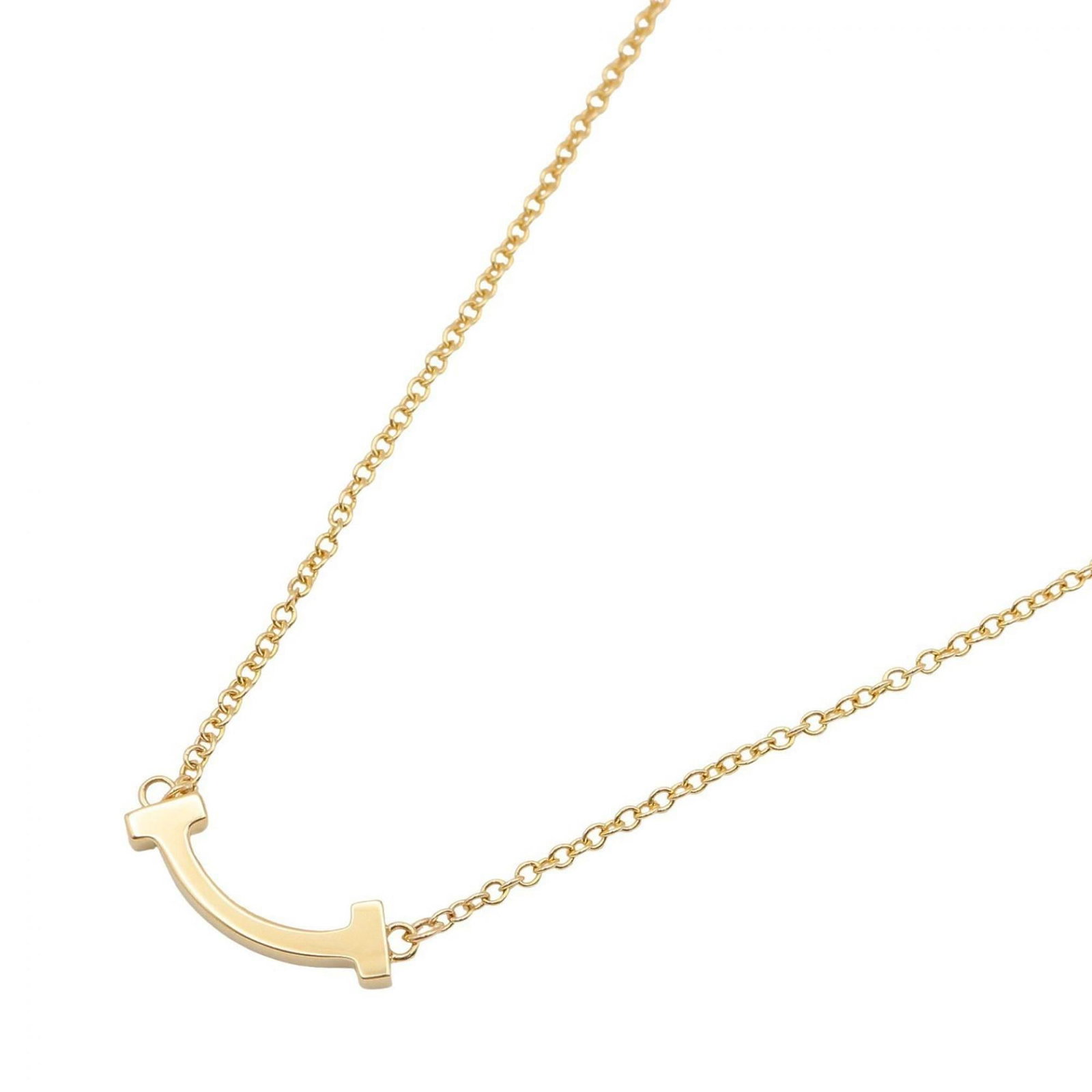 Tiffany & Co. T Smile Mini Necklace, 18K (Yellow Gold), Gold Tone, Men's Women's, Item Number: Tiffany & Co. T Smile Mini Necklace, 18K (Yellow Gold), Gold Tone, Men's Women's, Item Number Elevate your everyday style with this 18K yellow gold Tiffany & Co. T Smile Mini Necklace, featuring a