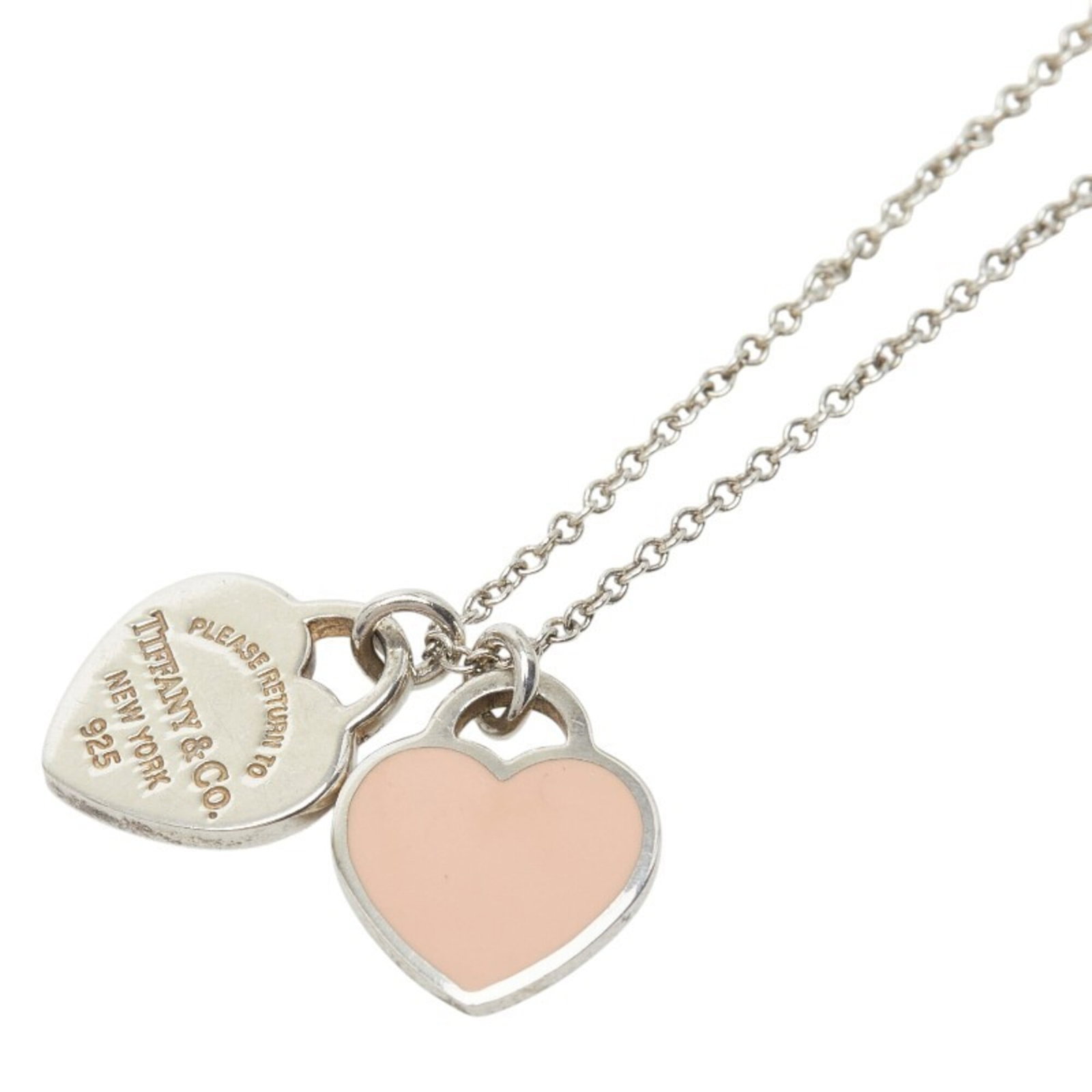 Tiffany & Co. Women's Double Heart Pendant Necklace in Silver: Tiffany & Co. Women's Double Heart Pendant Necklace in Silver A delicate Tiffany & Co. double heart pendant necklace in silver adds a touch of elegance to any outfit. This 925 sterling silver piece