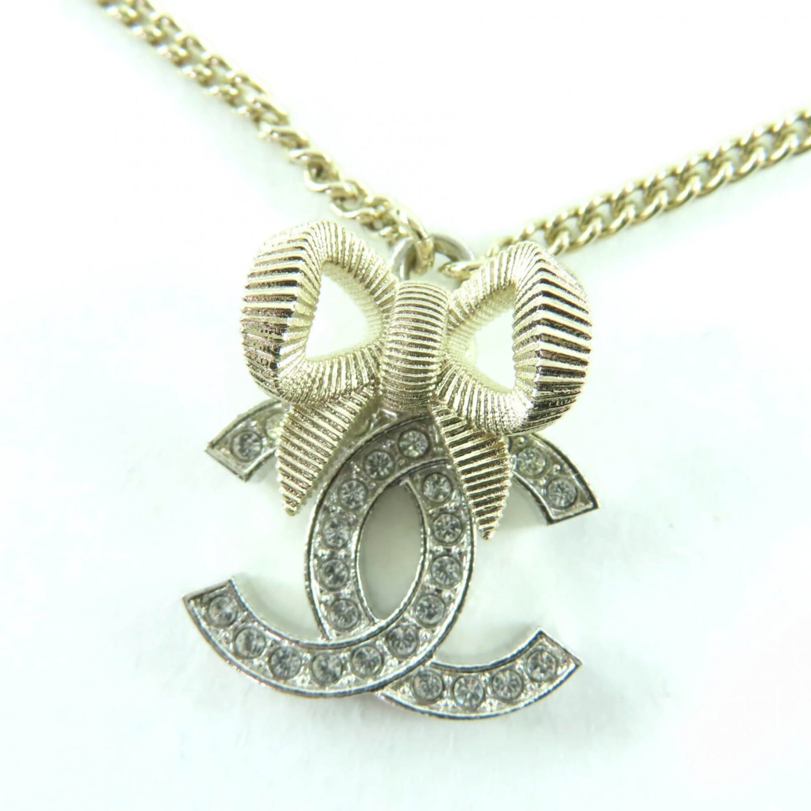 CHANEL B24K Coco Mark Ribbon Rhinestone Necklace, Champagne Gold, with Box, Made in Italy, Women's: CHANEL B24K Coco Mark Ribbon Rhinestone Necklace, Champagne Gold, with Box, Made in Italy, Women's Elevate your style with this exquisite CHANEL B24K Coco Mark Ribbon Rhinestone Necklace in champagne