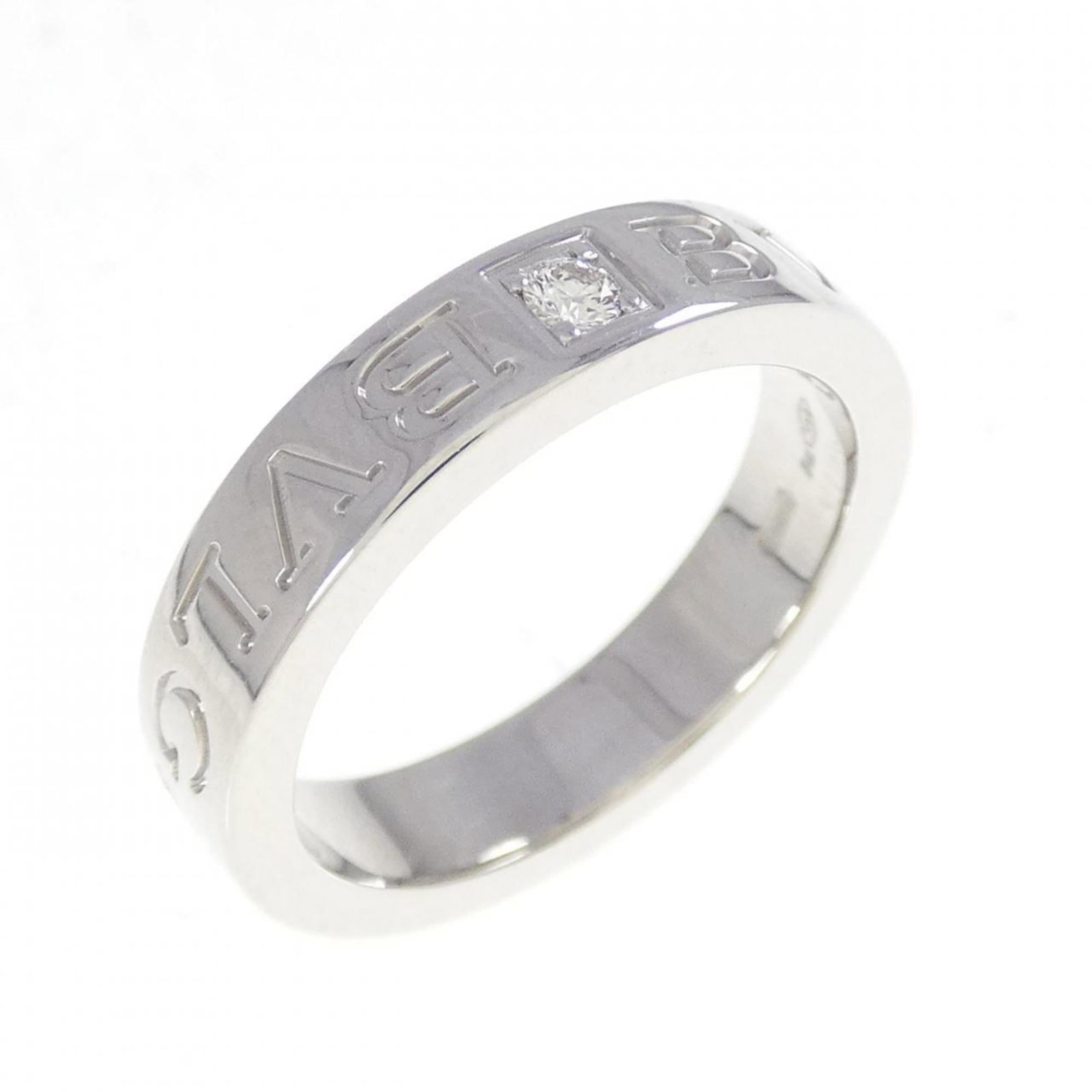 Bvlgari Band Ring White Gold (18K): Bvlgari Band Ring White Gold (18K) A sleek and sophisticated Bvlgari band ring in 18K white gold, adorned with a sparkling diamond. This elegant piece boasts a slender profile and a durable