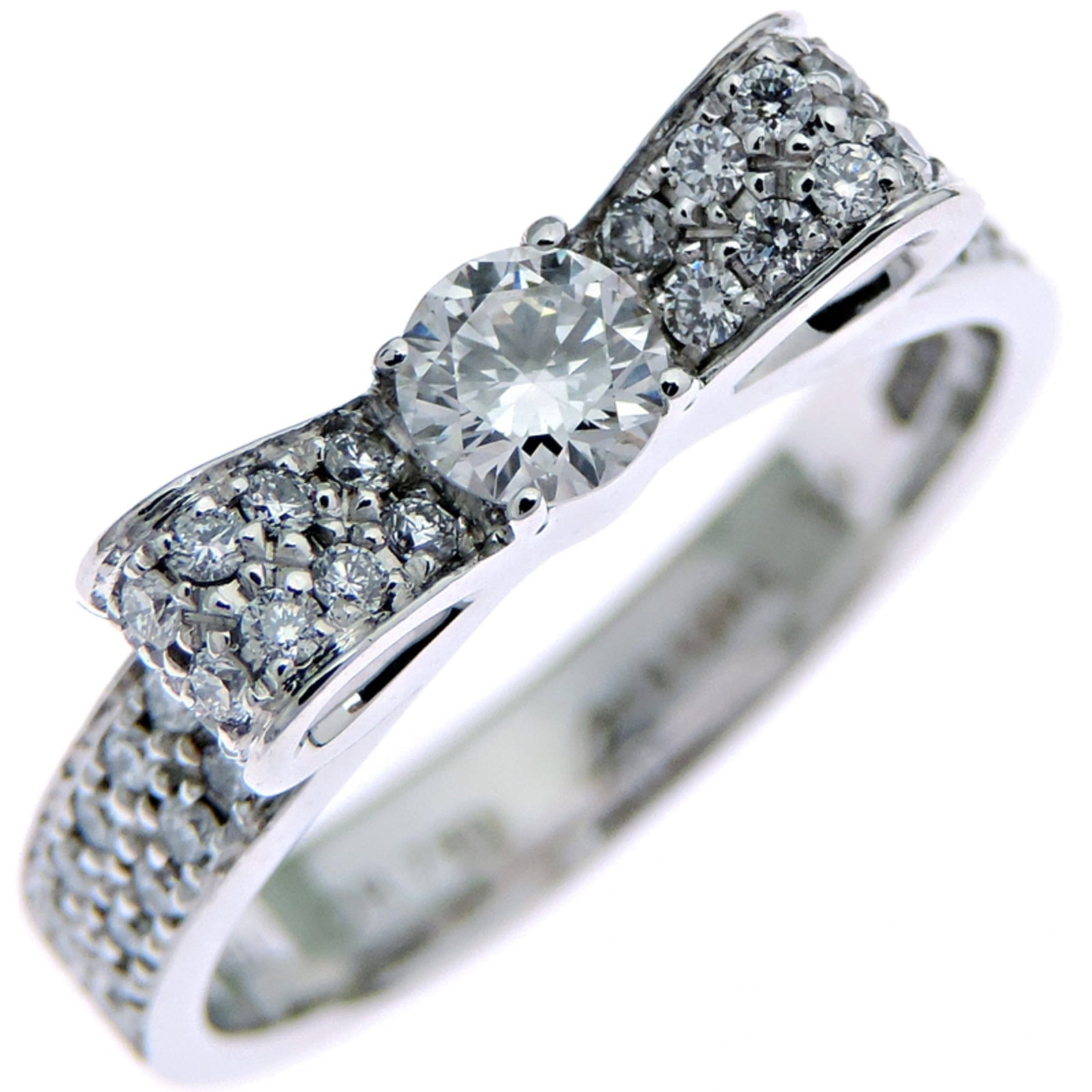 Chanel white gold band ring: Chanel white gold band ring A sleek and timeless Chanel band ring, this 18K white gold piece is adorned with a diamond stone, adding a touch of elegance to any outfit. With its classic design and prem