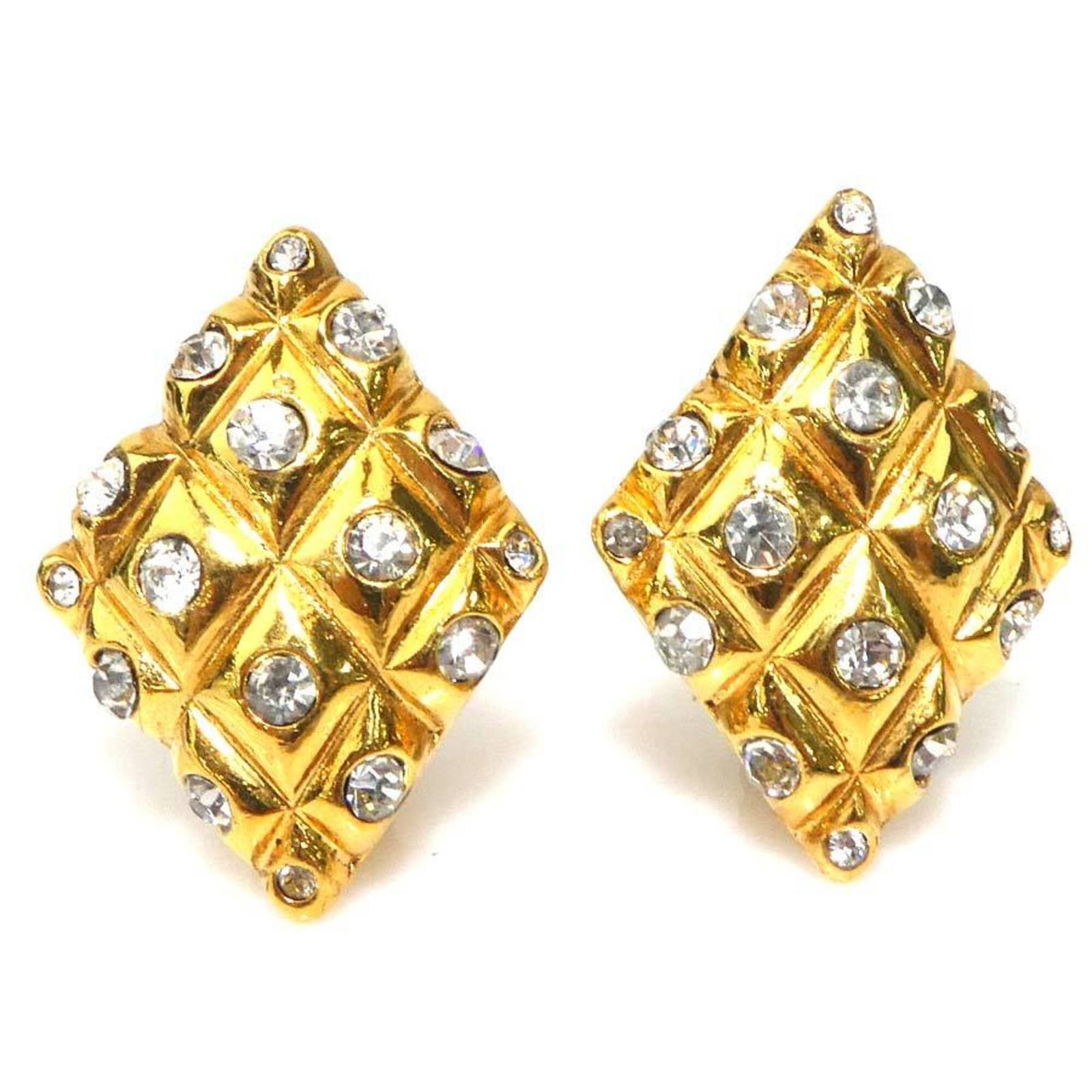 Chanel Clip Earrings Metal, Rhinestone: Chanel Clip Earrings Metal, Rhinestone Elevate your everyday look with these iconic Chanel clip earrings, featuring intricate metalwork and sparkling rhinestones in gold and silver hues. With their