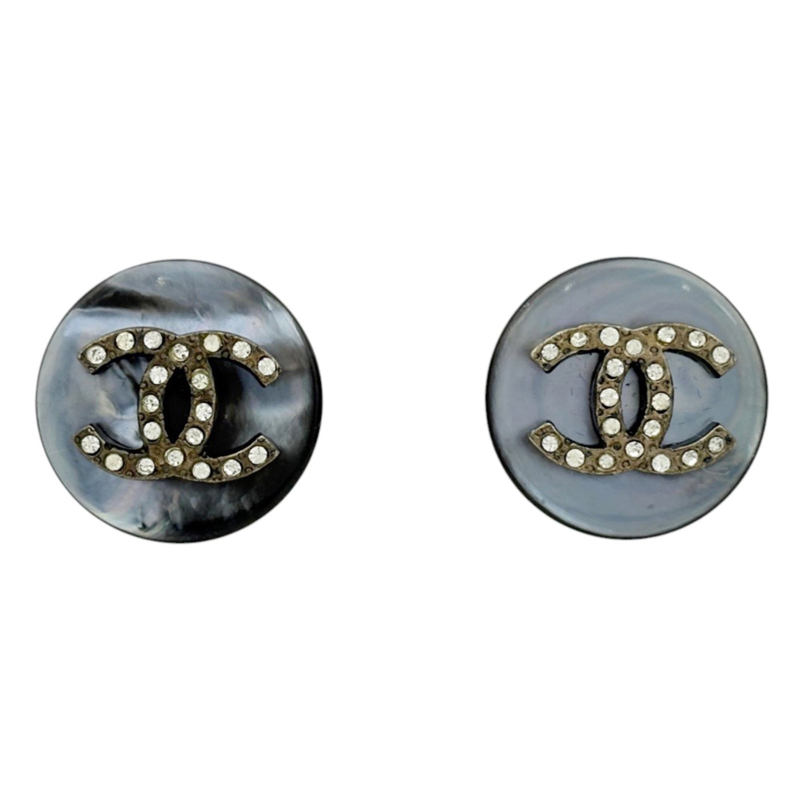 Chanel Clip Earrings Metal, Rhinestone: Chanel Clip Earrings Metal, Rhinestone Elegant and sophisticated, these Chanel clip earrings feature a sleek metal design adorned with rhinestones in a striking gray and silver hue. With their