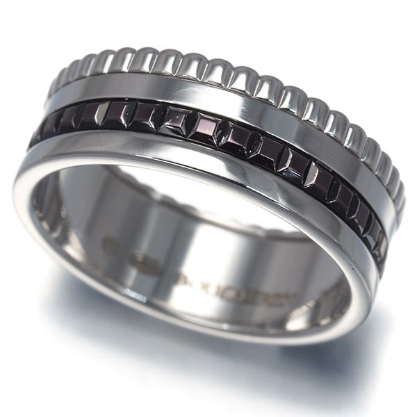White Gold Boucheron 750 18k Small Quatre Black Ring: White Gold Boucheron 750 18k Small Quatre Black Ring A sleek and sophisticated 18k white gold ring from the renowned French brand Boucheron, this Quatre Black Ring boasts a striking design with no