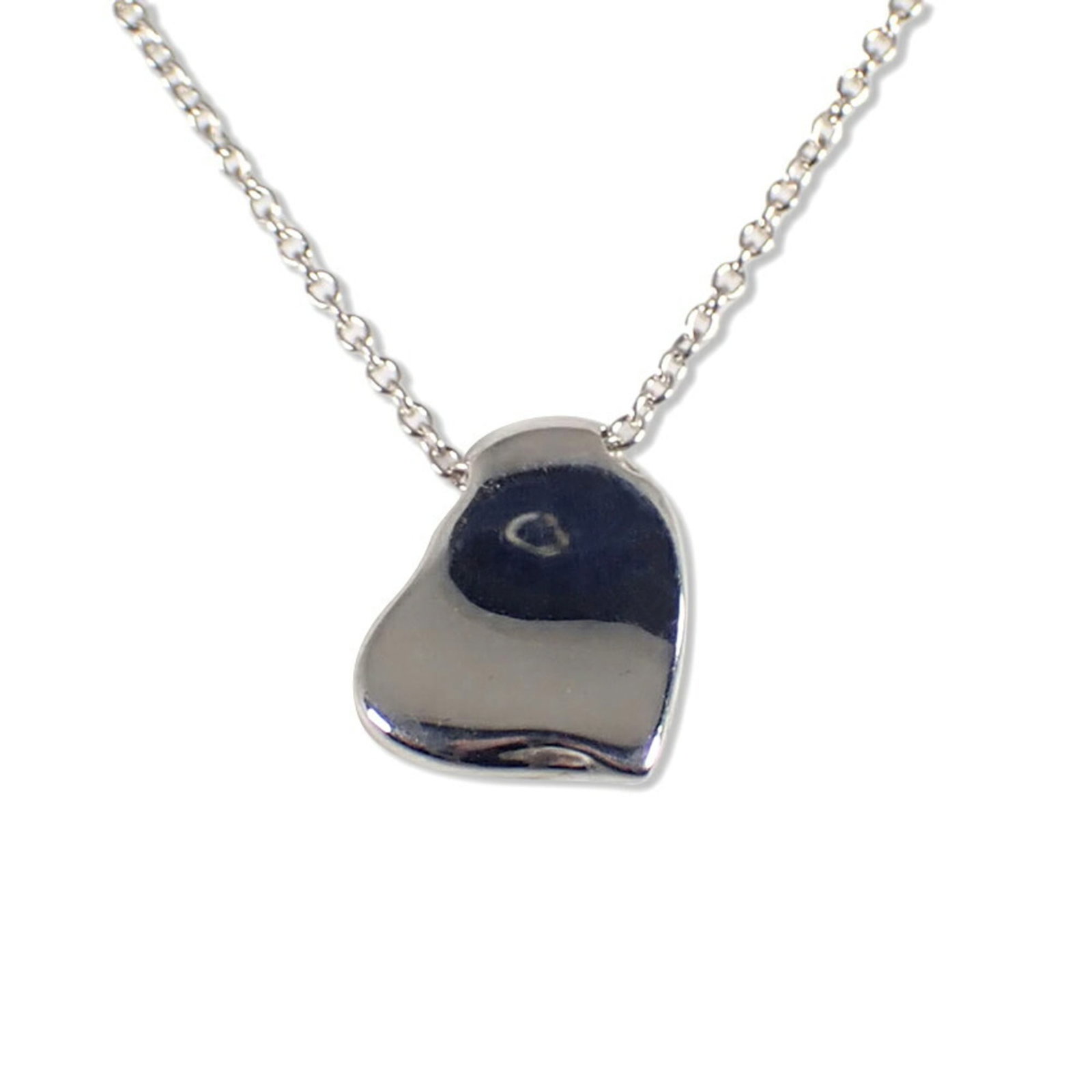 Tiffany necklace full heart pendant: Tiffany necklace full heart pendant A beautiful Tiffany necklace featuring a full heart pendant in sterling silver 925, this elegant piece boasts classic design with subtle wear evident from its used