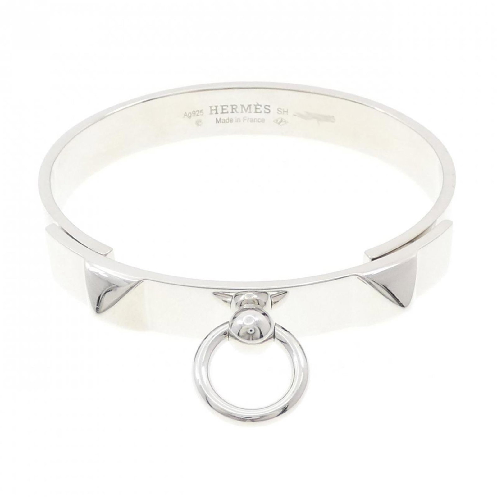 Hermes bangle silver 925: Hermes bangle silver 925 A sleek and sophisticated silver bangle from renowned luxury brand Hermes, crafted from 925 sterling silver with a subtle width of 1.82cm. This elegant accessory boasts a tota