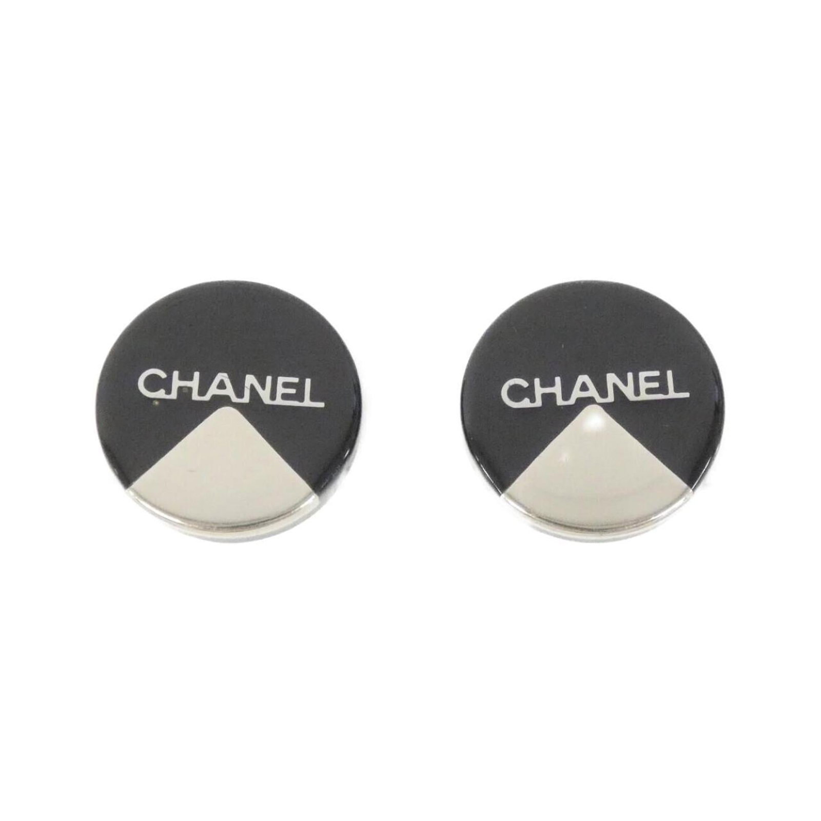 Earrings by Chanel: Earrings by Chanel Authentic Chanel clip earrings in sleek black, featuring a timeless design that adds a touch of sophistication to any outfit. With their 18mm x 18mm size and subtle scratches from