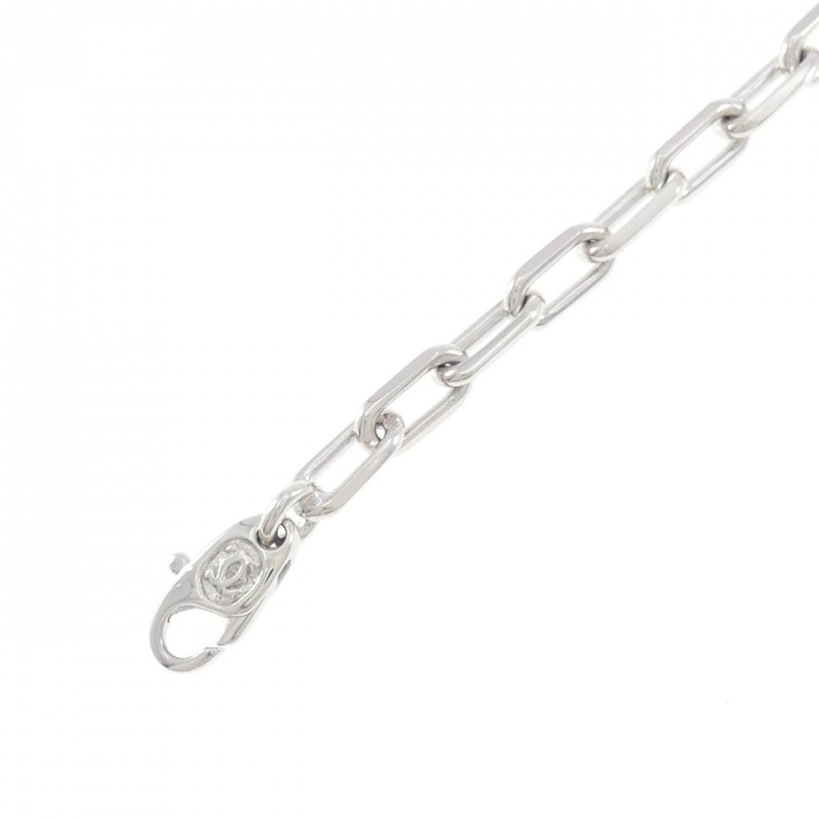 Cartier Charm White Gold 18K: Cartier Charm White Gold 18K A Cartier Charm bracelet in white gold 18K, featuring a sleek and slender design with a total length of 18.5cm. This pre-owned charm bracelet boasts a classic look, with s