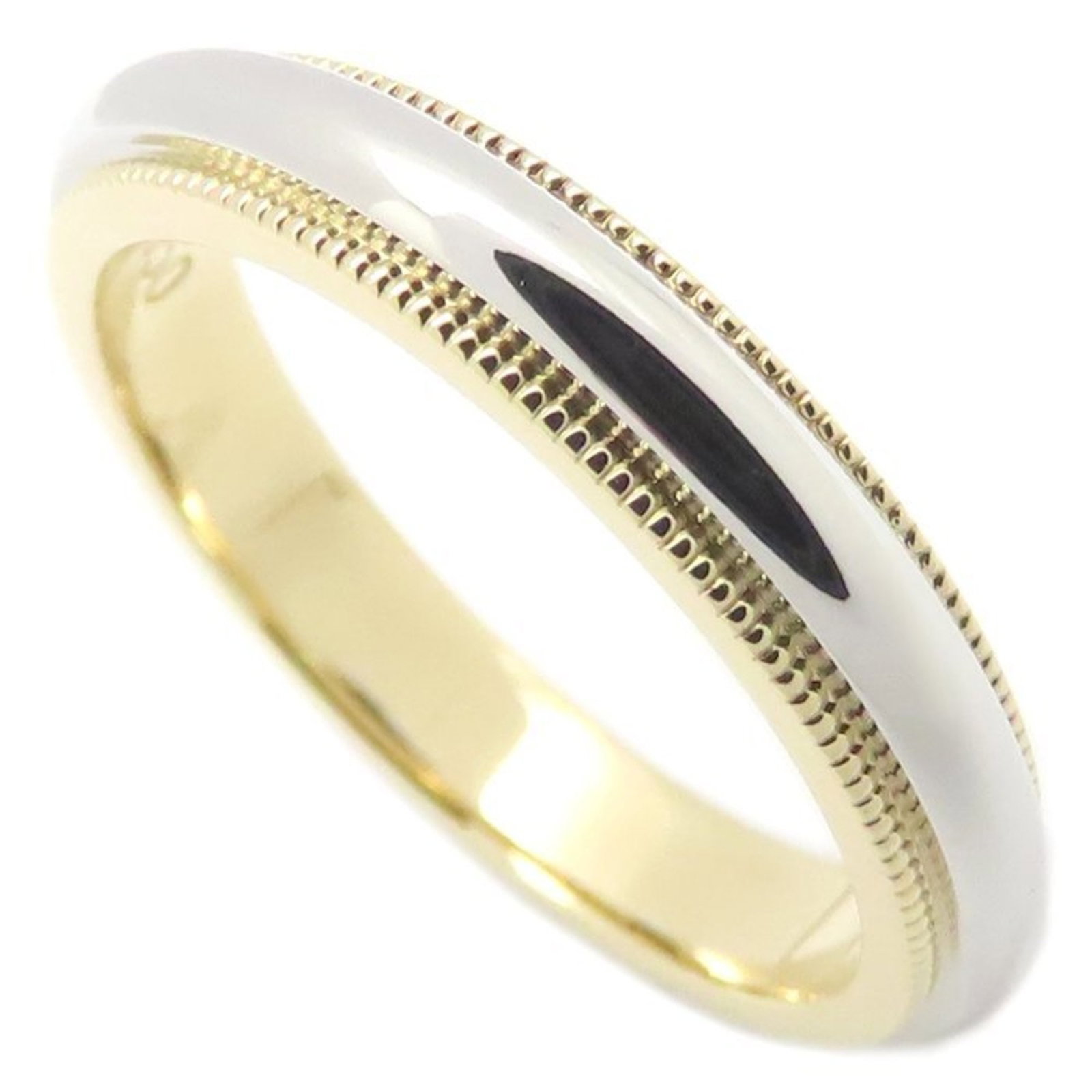 Tiffany Band Ring Platinum 950, Yellow Gold (18K): Tiffany Band Ring Platinum 950, Yellow Gold (18K) A beautiful Tiffany band ring in platinum 950 and yellow gold (18K) awaits you. This stylish piece boasts a sleek, high-quality design that exudes