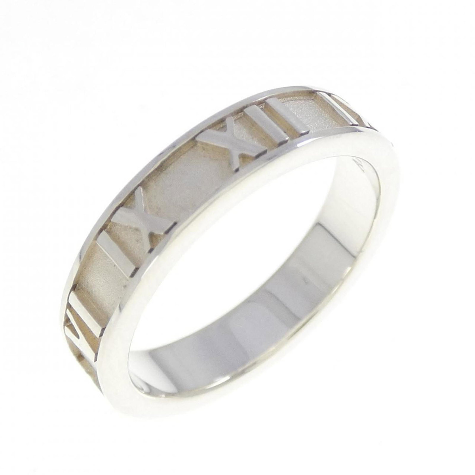 Tiffany silver ring band.: Tiffany silver ring band. A sleek and timeless Tiffany silver ring band, this 925 sterling silver piece boasts a classic design that complements any style. With a slightly smaller size to fit the 4.5