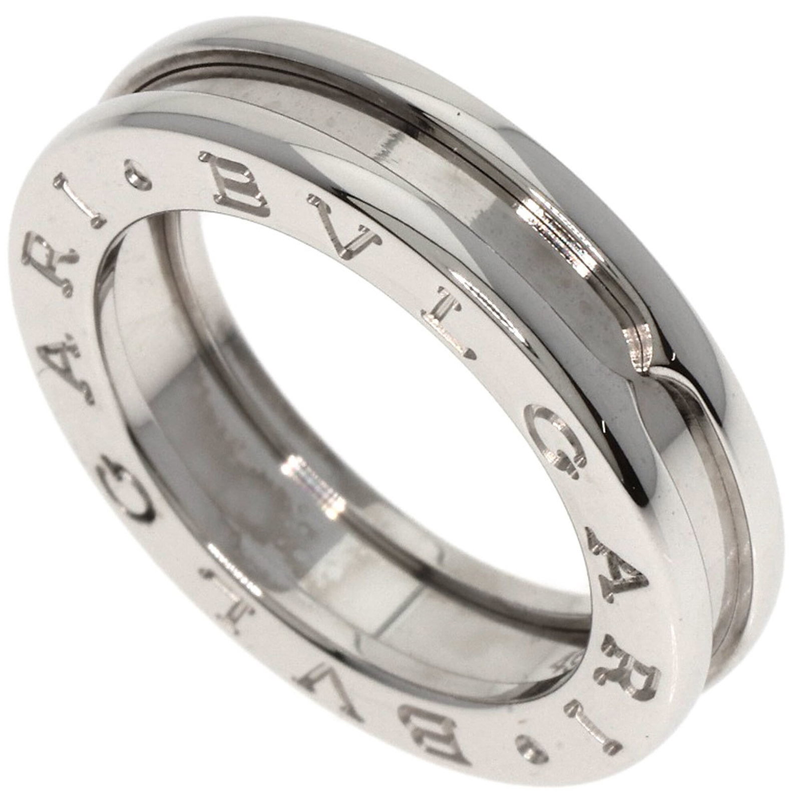 Bvlgari ring is a band.: Bvlgari ring is a band. A 18K white gold Bvlgari band ring with a slender 4.8mm width, weighing 7.84g, is up for auction. This used ring has some minor scratches and dirt but remains in very good cond