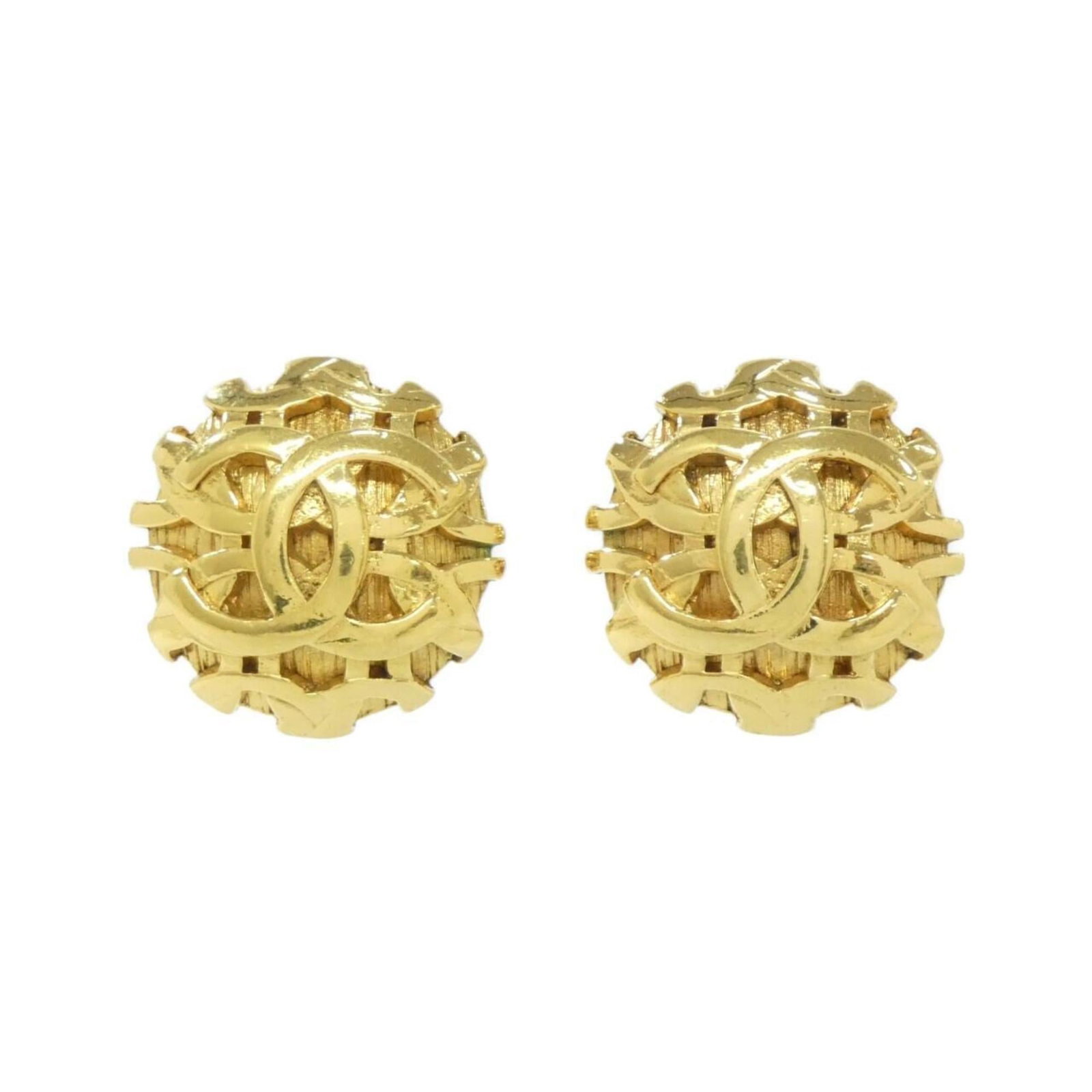 Earrings by Chanel: Earrings by Chanel Elegant gold clip earrings from Chanel, featuring a timeless design that adds a touch of sophistication to any outfit. With a few subtle signs of wear, these earrings retain their c