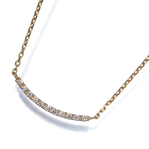 Yellow Gold Star Necklace Diamond 0.04ct 18k 750: Yellow Gold Star Necklace Diamond 0.04ct 18k 750 A delicate 18k yellow gold star necklace showcases a natural diamond of 0.04ct, crafted in Japan. The subtle sparkle of this tiny gemstone is set