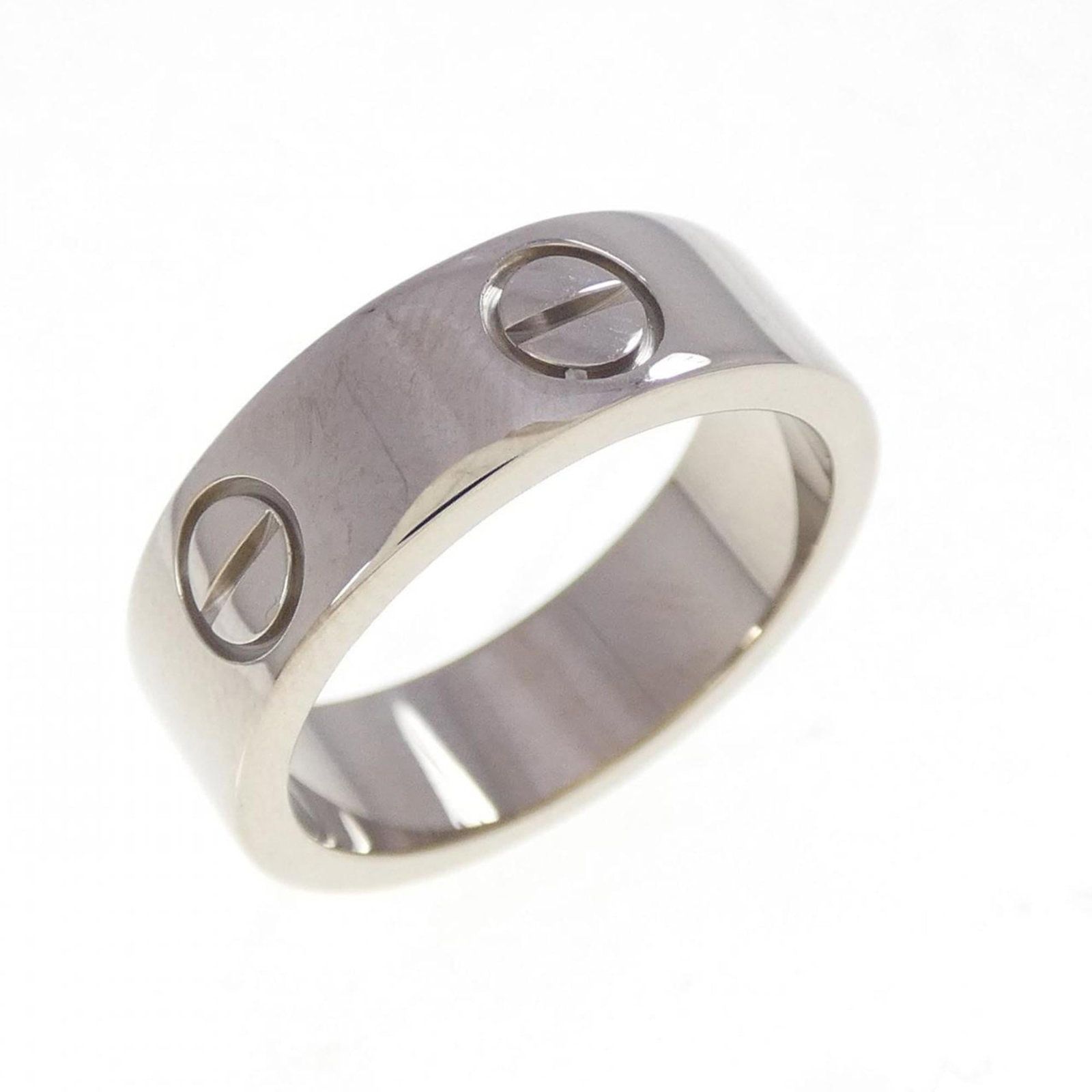 Cartier white gold ring band: Cartier white gold ring band A stunning Cartier white gold ring band, crafted from 18K white gold, adds a touch of elegance to any outfit. With its sleek design and high-quality material, this band