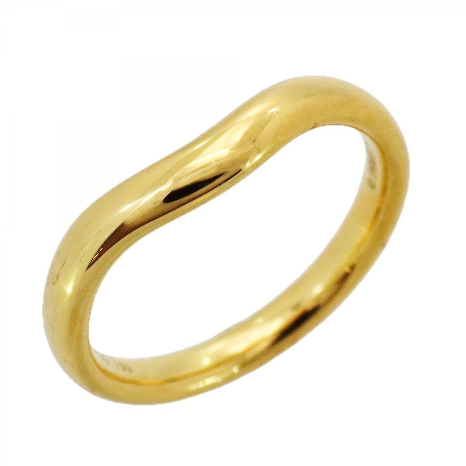Tiffany 18k yellow gold band ring: Tiffany 18k yellow gold band ring A beautiful 18k yellow gold band ring from Tiffany, this used ring boasts a classic design with subtle signs of wear. Traces of usage and minor scratches can be