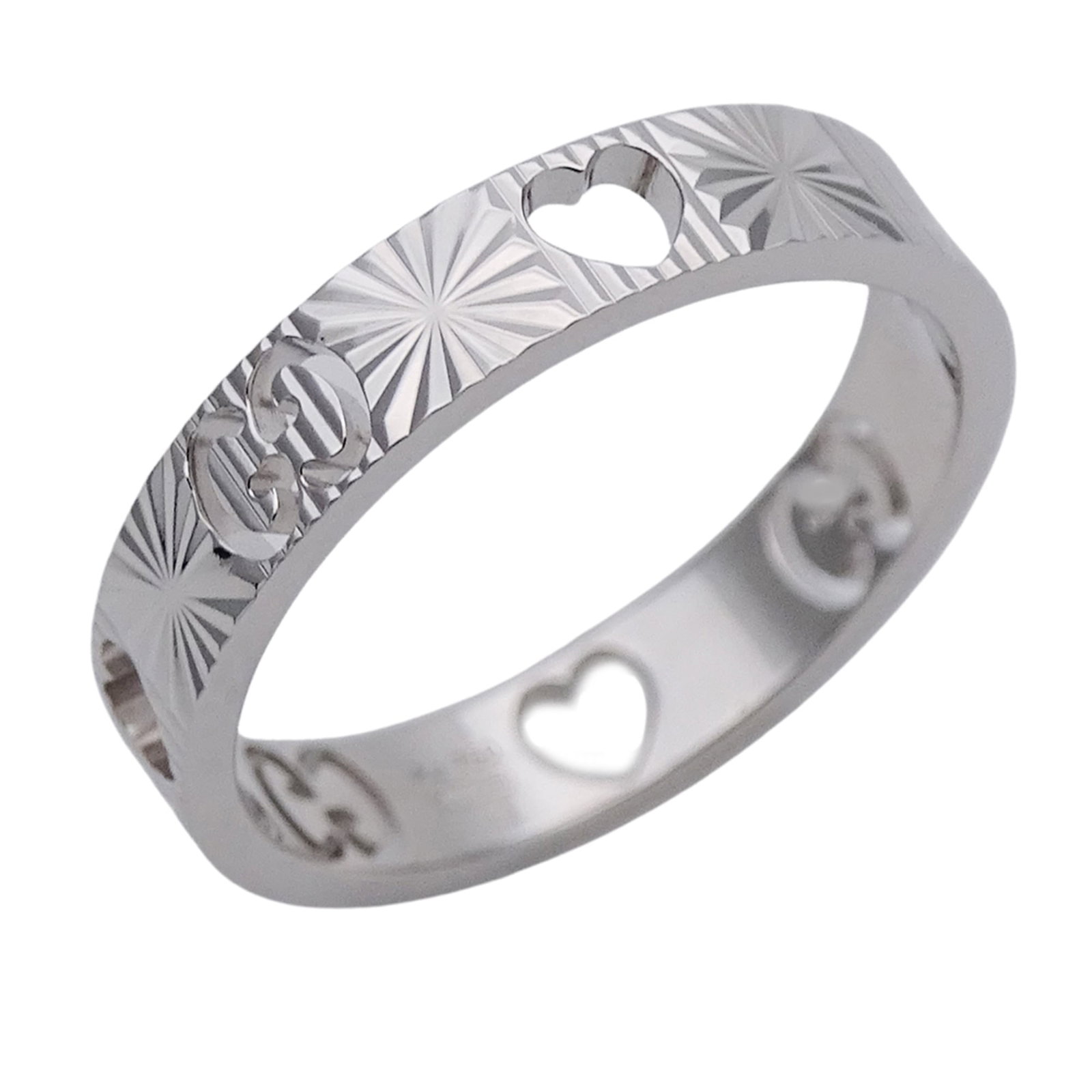 Gucci white gold band ring: Gucci white gold band ring A sleek Gucci white gold band ring adds a touch of luxury to any outfit with its elegant design and 18K white gold construction. With a few subtle signs of wear, this used r