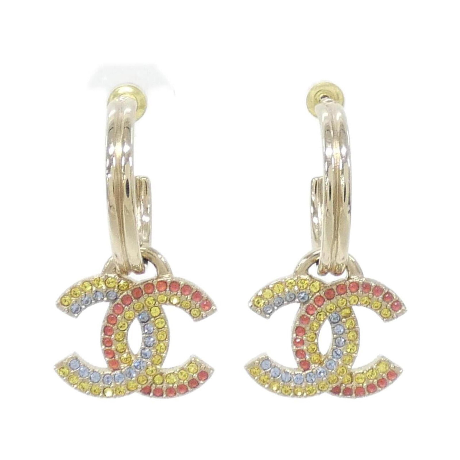 Chanel Stud Earrings: Chanel Stud Earrings Elevate your style with these authentic Chanel stud earrings, featuring a sleek and modern design in various vibrant hues - blue, gold, pink, and yellow. With their classic stud
